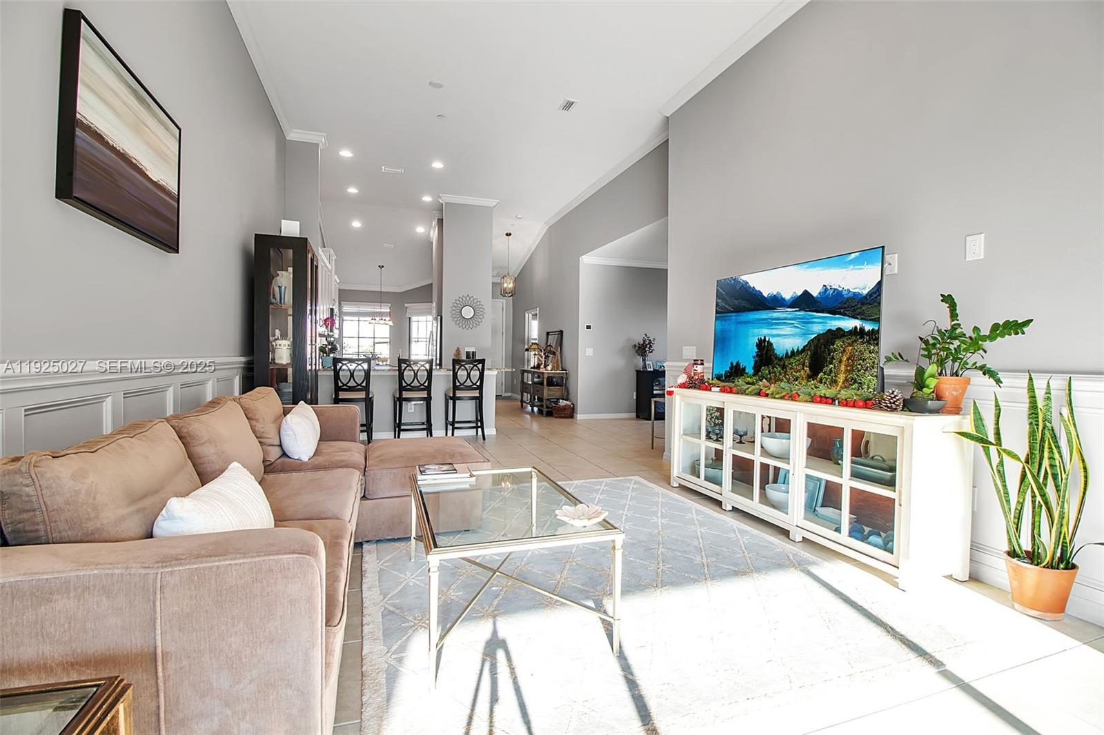 13608 Messina Loop, Unit 201 Bradenton, FL 34211 - Photo 25 of 68 a living room with furniture and a large window