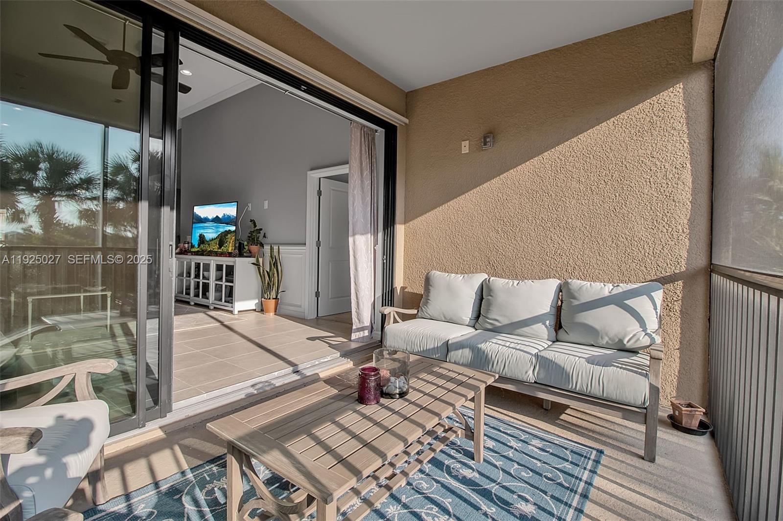 13608 Messina Loop, Unit 201 Bradenton, FL 34211 - Photo 28 of 68 a outdoor living space with furniture