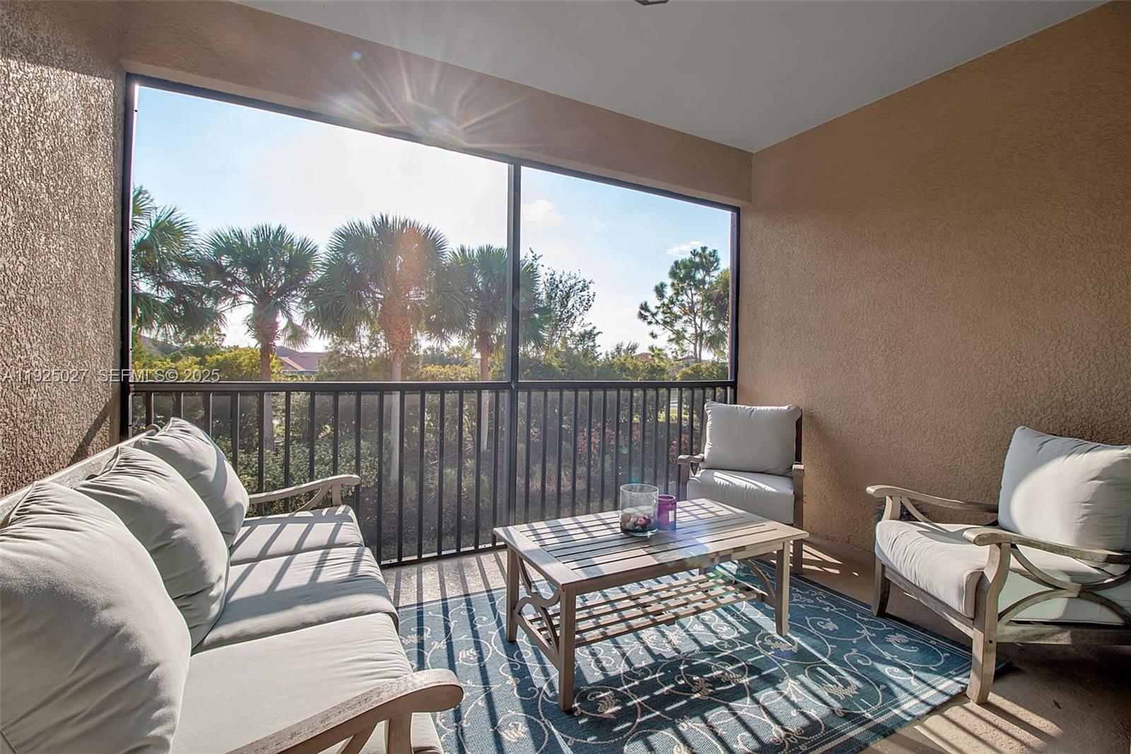 13608 Messina Loop, Unit 201 Bradenton, FL 34211 - Photo 29 of 68 a roof deck with couches and wooden floor