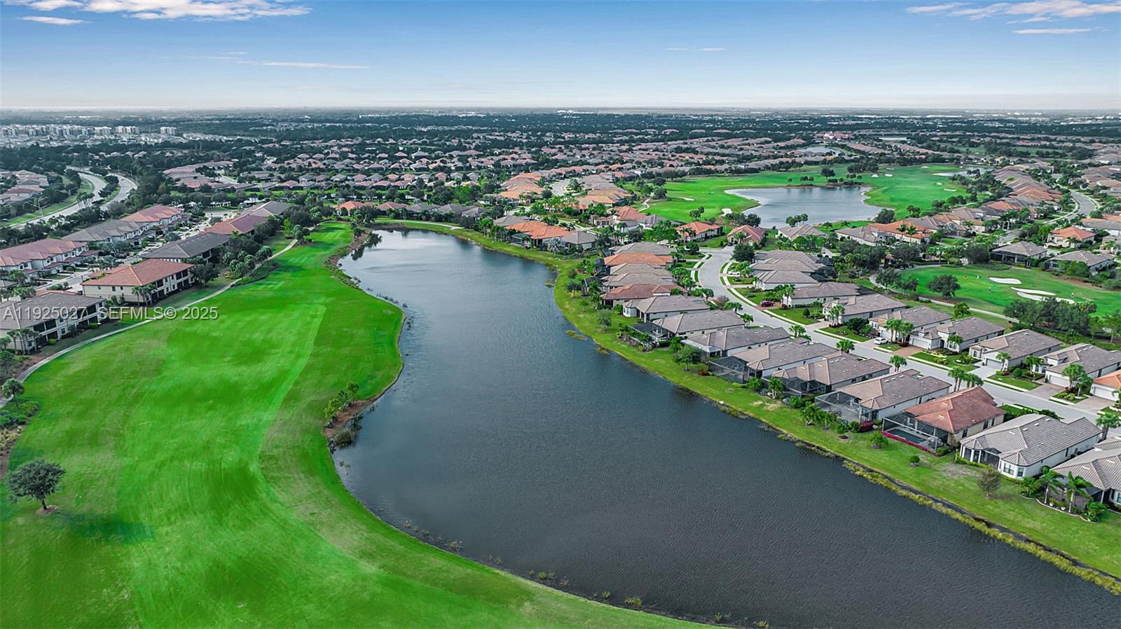 13608 Messina Loop, Unit 201 Bradenton, FL 34211 - Photo 40 of 68 an aerial view of a residential houses with outdoor space and trees