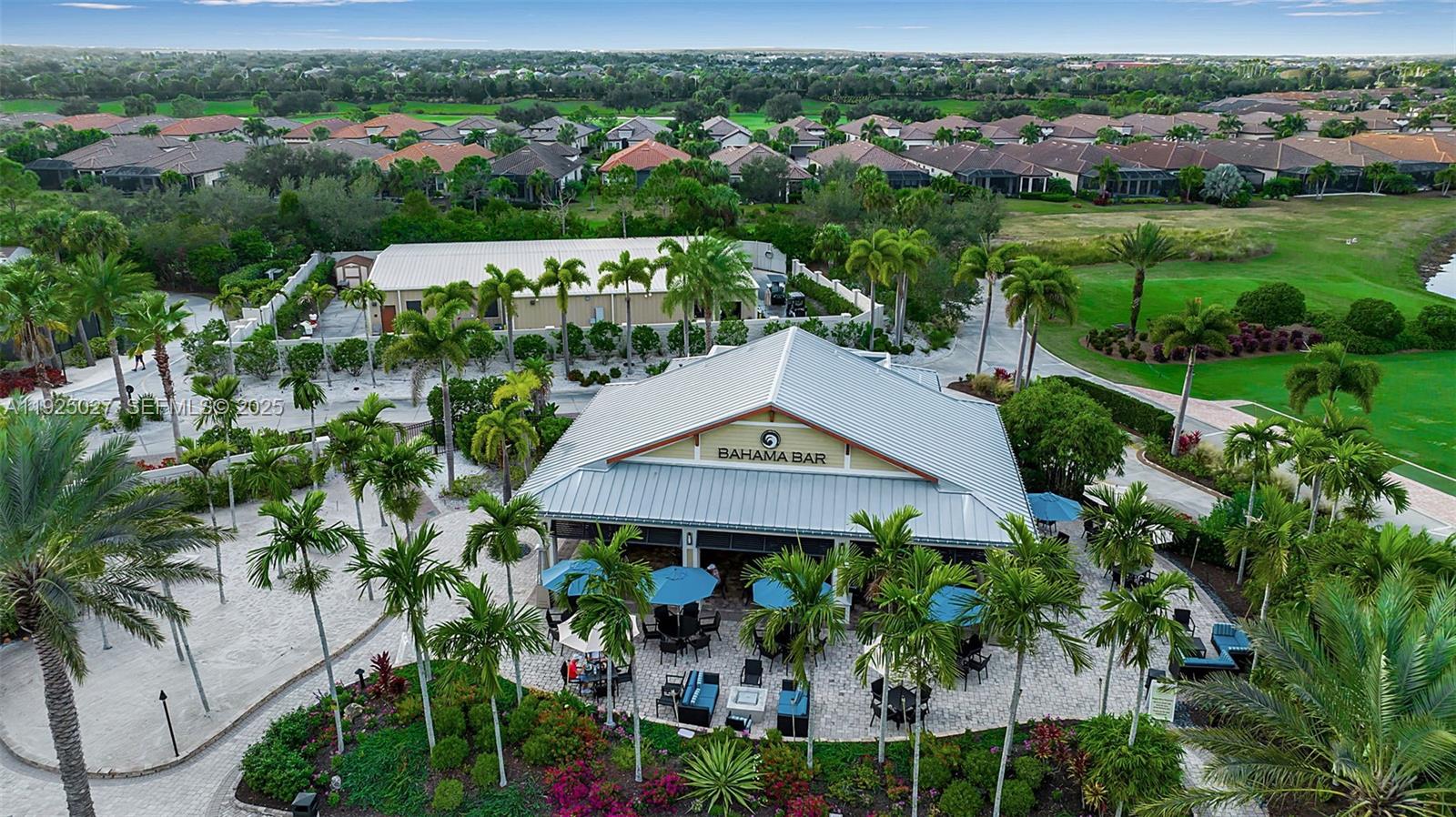 13608 Messina Loop, Unit 201 Bradenton, FL 34211 - Photo 5 of 68 an aerial view of a house with a garden