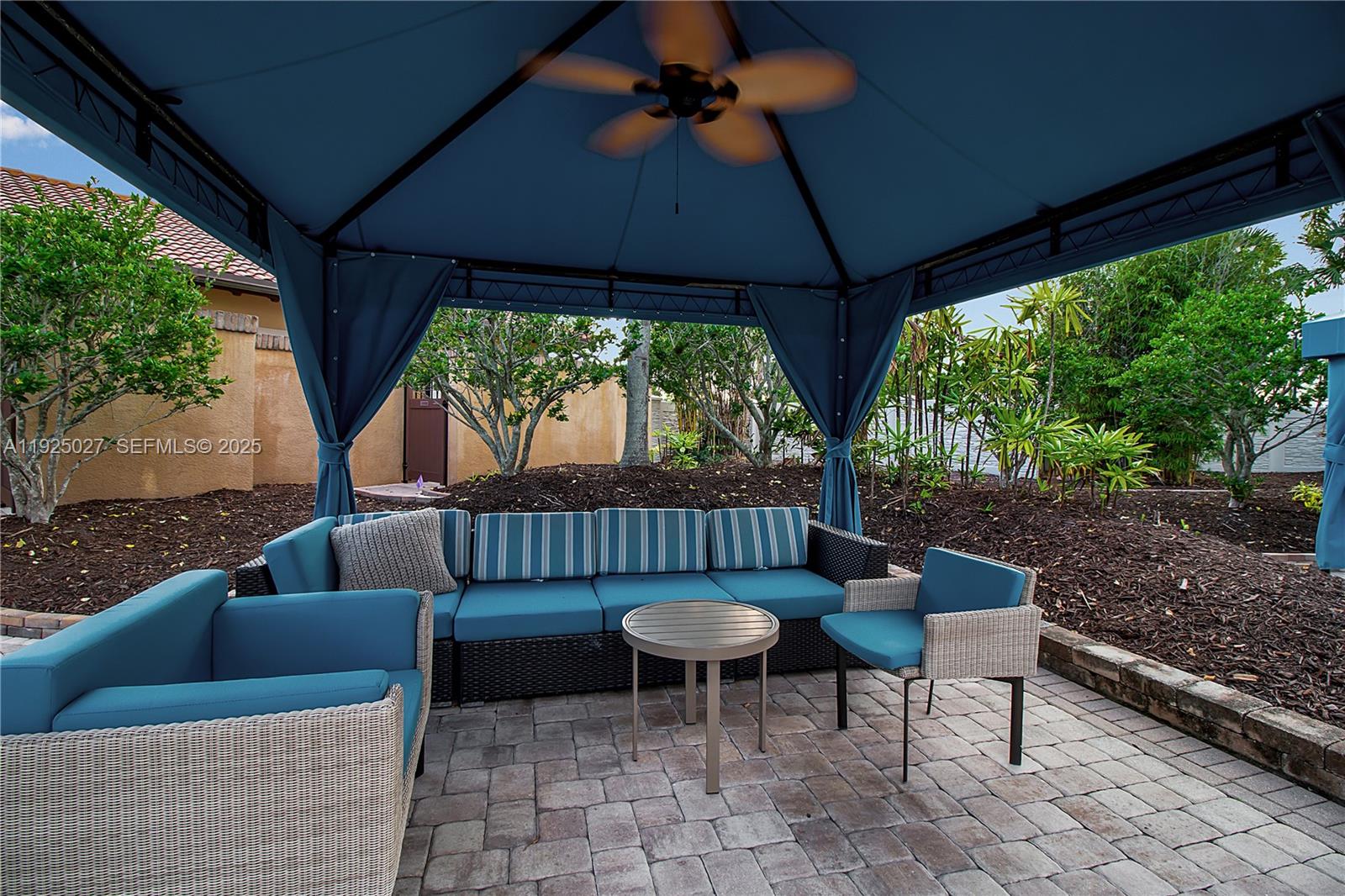 13608 Messina Loop, Unit 201 Bradenton, FL 34211 - Photo 53 of 68 a view of a chairs and table in the patio