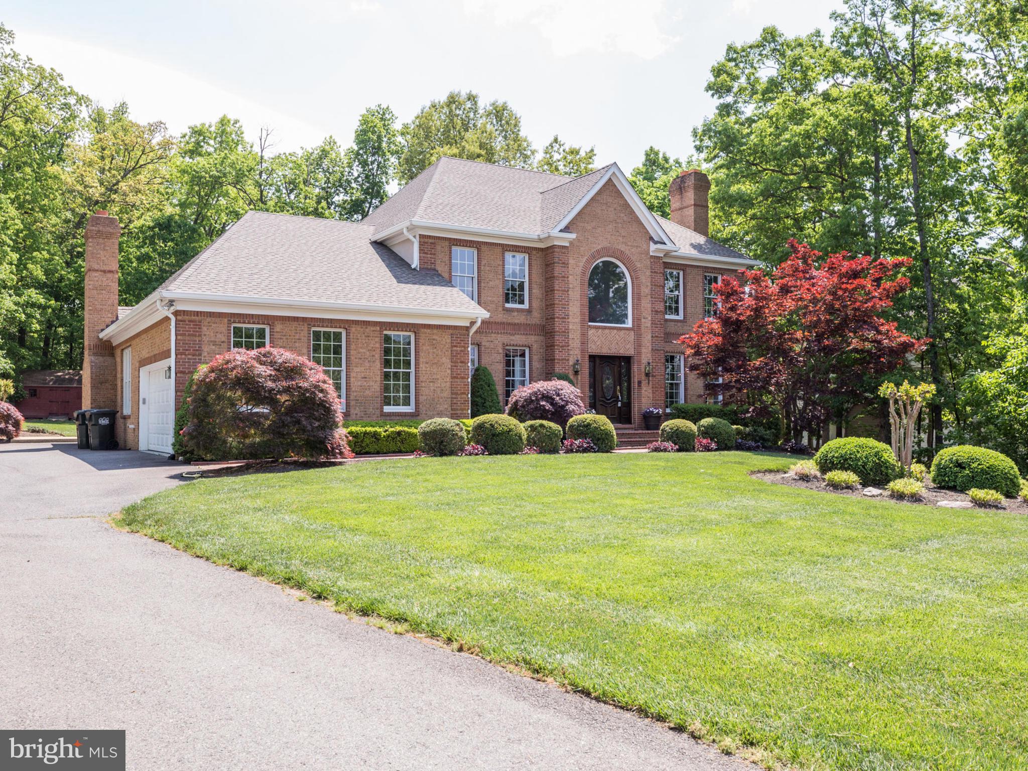 5613 Clifton Road Clifton, VA 20124 - Photo 2 of 42 Long and wide drive way w/ additional parking.