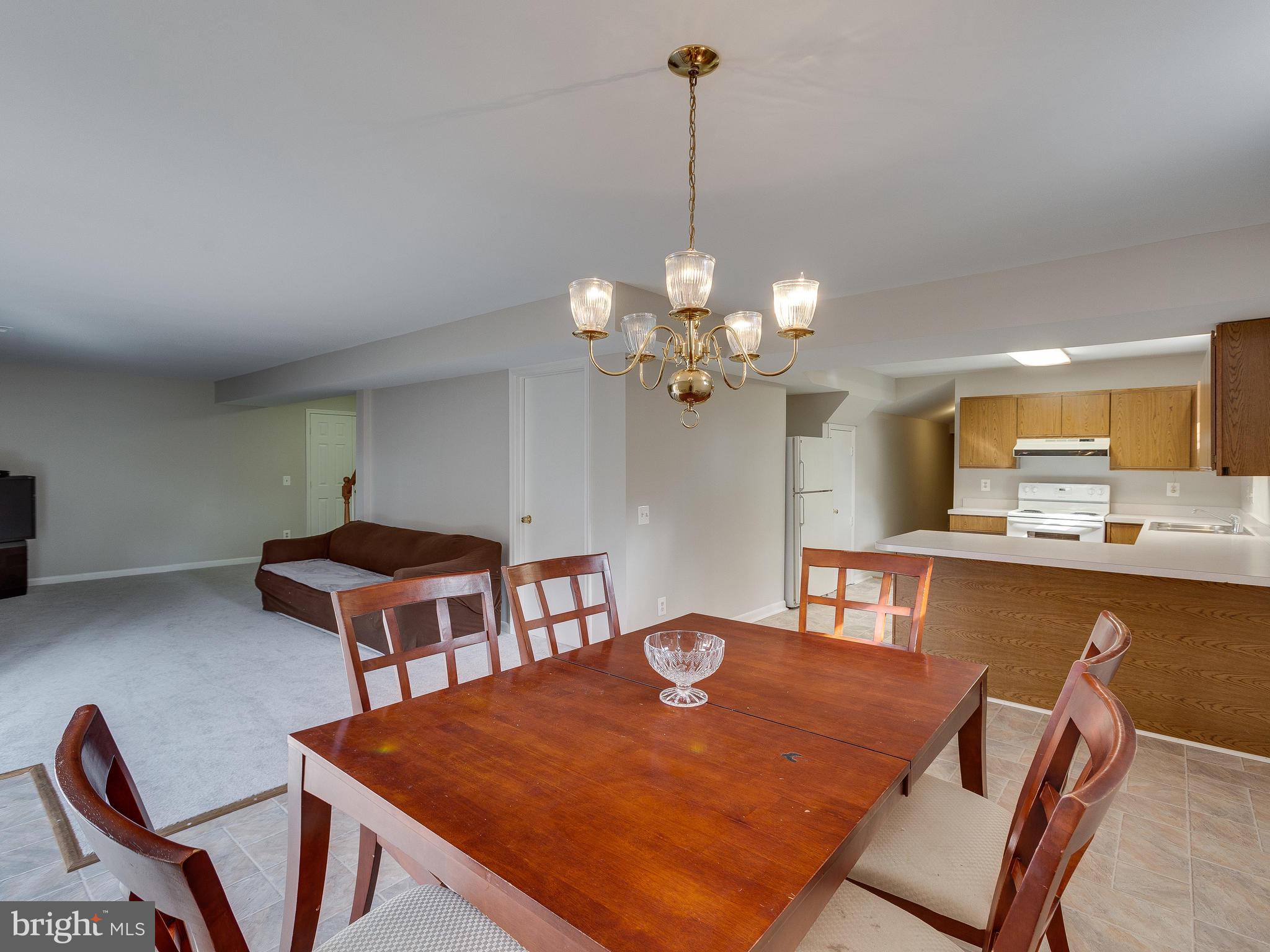 5613 Clifton Road Clifton, VA 20124 - Photo 31 of 42 Basement w/ sitting, dining & kitchen area.