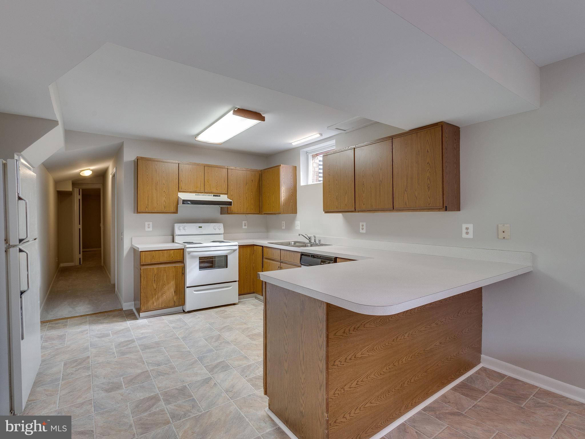 5613 Clifton Road Clifton, VA 20124 - Photo 32 of 42 Basement kitchen area.