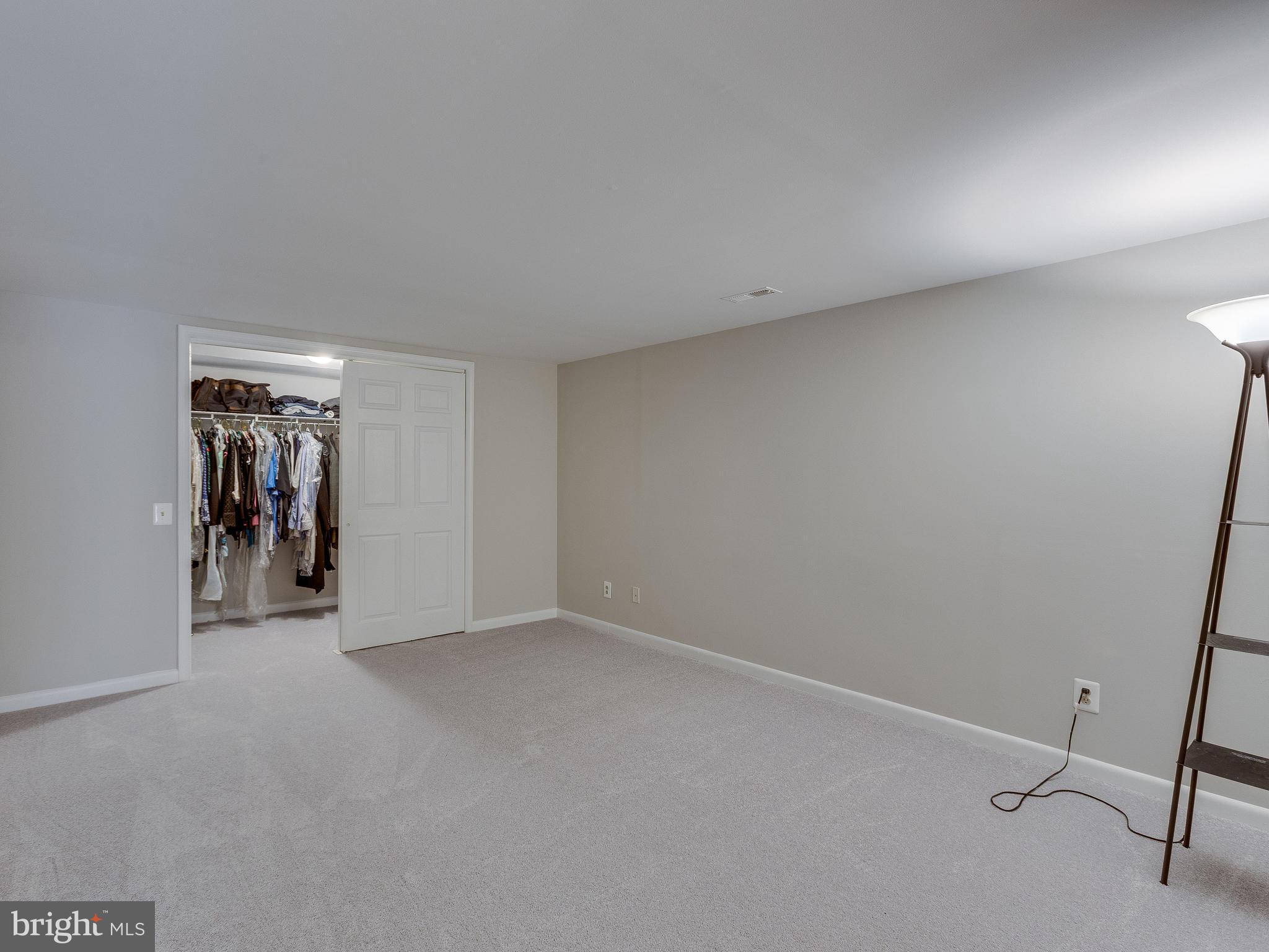 5613 Clifton Road Clifton, VA 20124 - Photo 34 of 42 Basement Room #1 w/ walk-in closet.