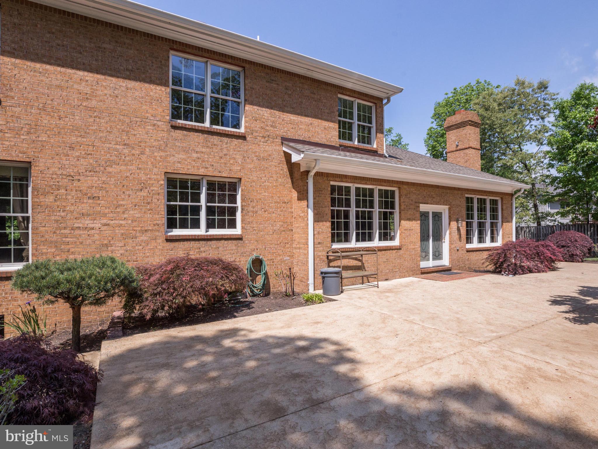 5613 Clifton Road Clifton, VA 20124 - Photo 37 of 42 Stunning patio area w/ brick exterior.