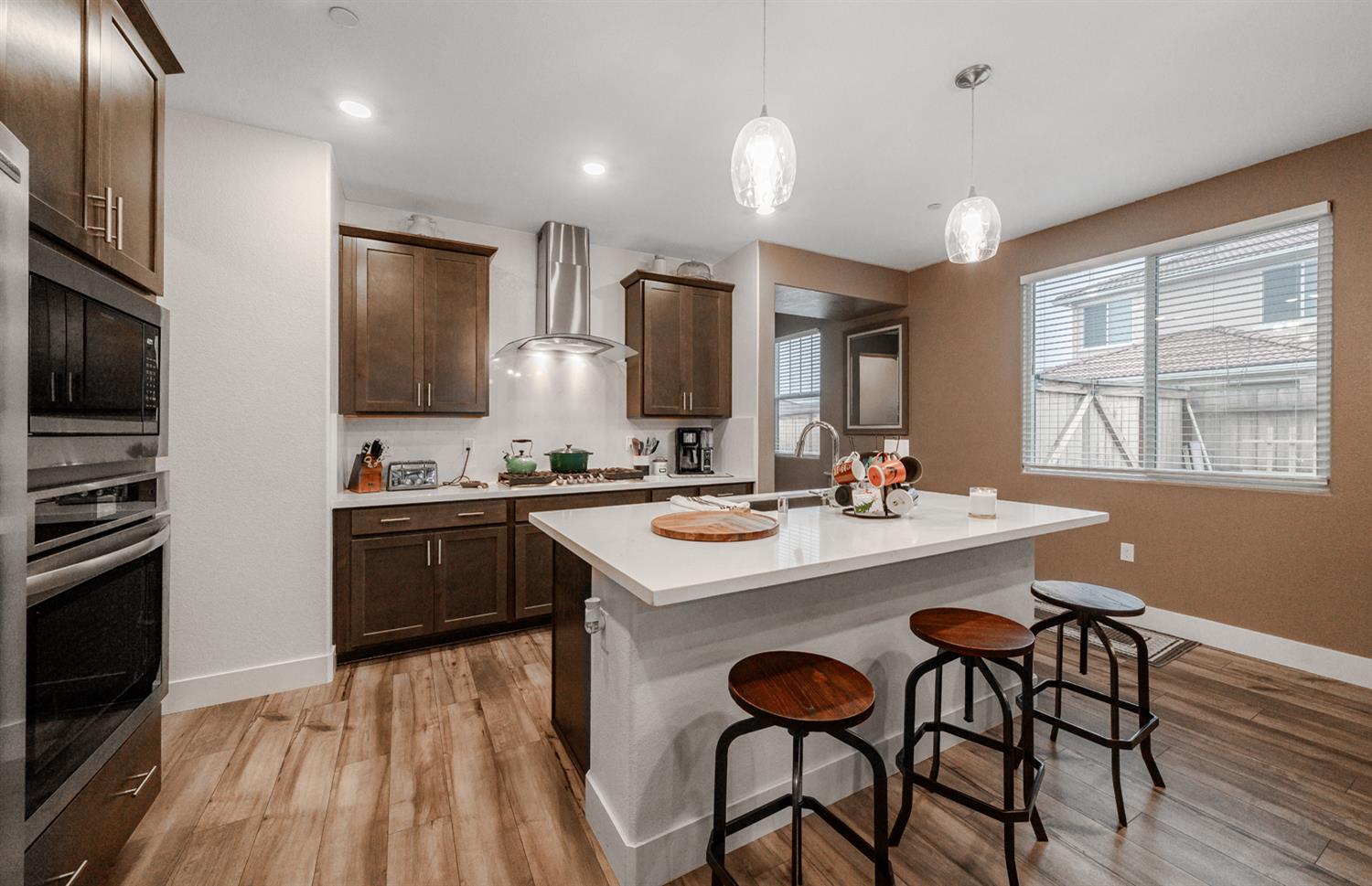 4414 Hawkfinch Circle Rancho Cordova, CA 95742 - Photo 12 of 40 a kitchen with a sink appliances and cabinets