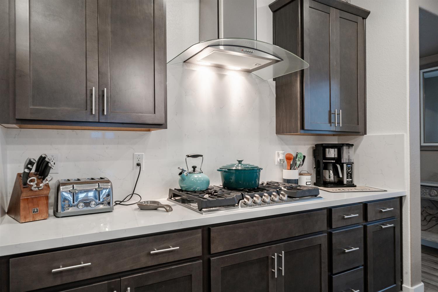 4414 Hawkfinch Circle Rancho Cordova, CA 95742 - Photo 21 of 40 a kitchen with a sink and cabinets