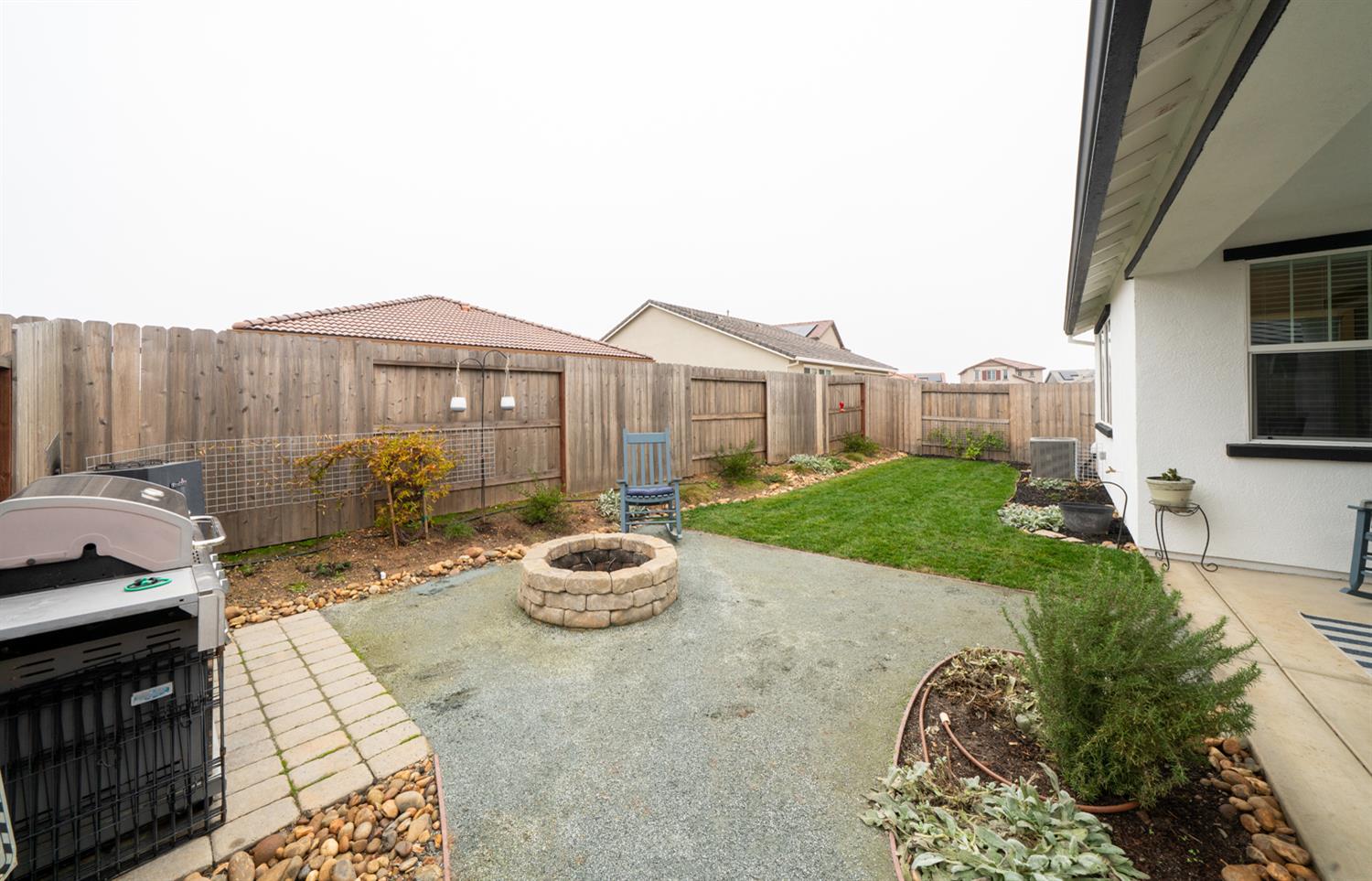 4414 Hawkfinch Circle Rancho Cordova, CA 95742 - Photo 35 of 40 a view of a patio with table and chairs and potted plants