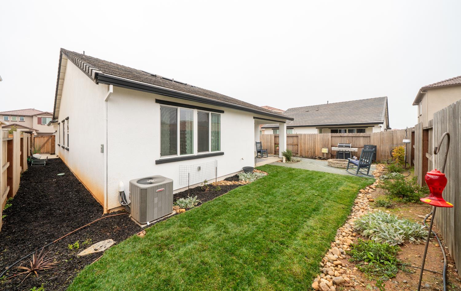 4414 Hawkfinch Circle Rancho Cordova, CA 95742 - Photo 37 of 40 a front view of a house with garden