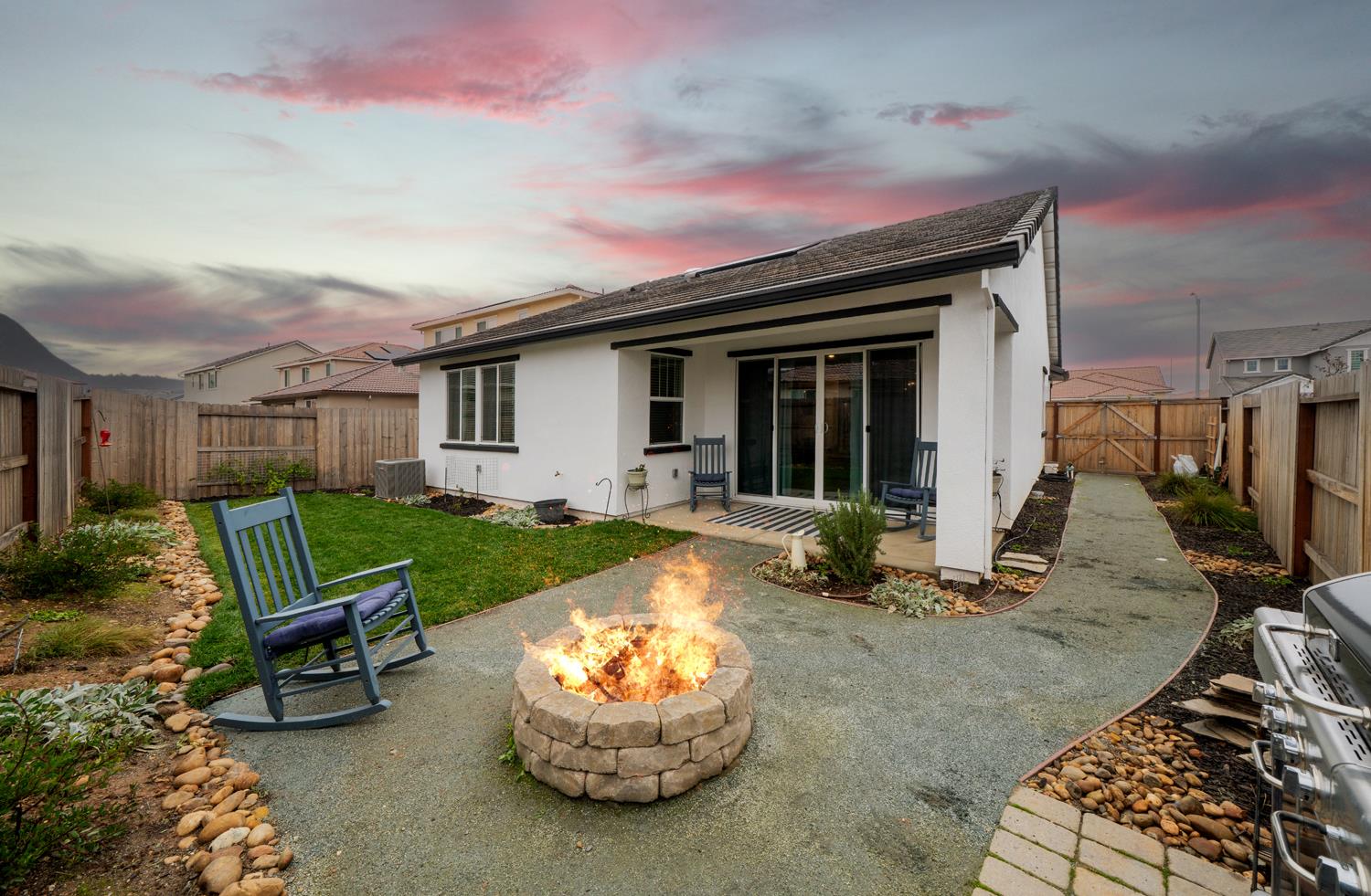 4414 Hawkfinch Circle Rancho Cordova, CA 95742 - Photo 5 of 40 a view of a house with backyard sitting area and garden