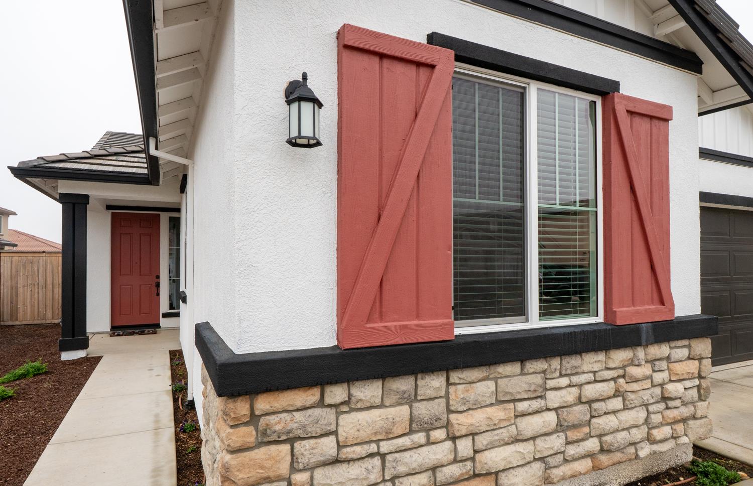 4414 Hawkfinch Circle Rancho Cordova, CA 95742 - Photo 7 of 40 a front view of a house with a gate