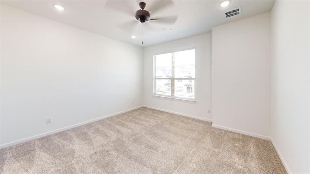 285 Buck Ridge Drive Frisco, TX 75068 - Photo 9 of 20 Empty room with light carpet, ceiling fan, and recessed lighting