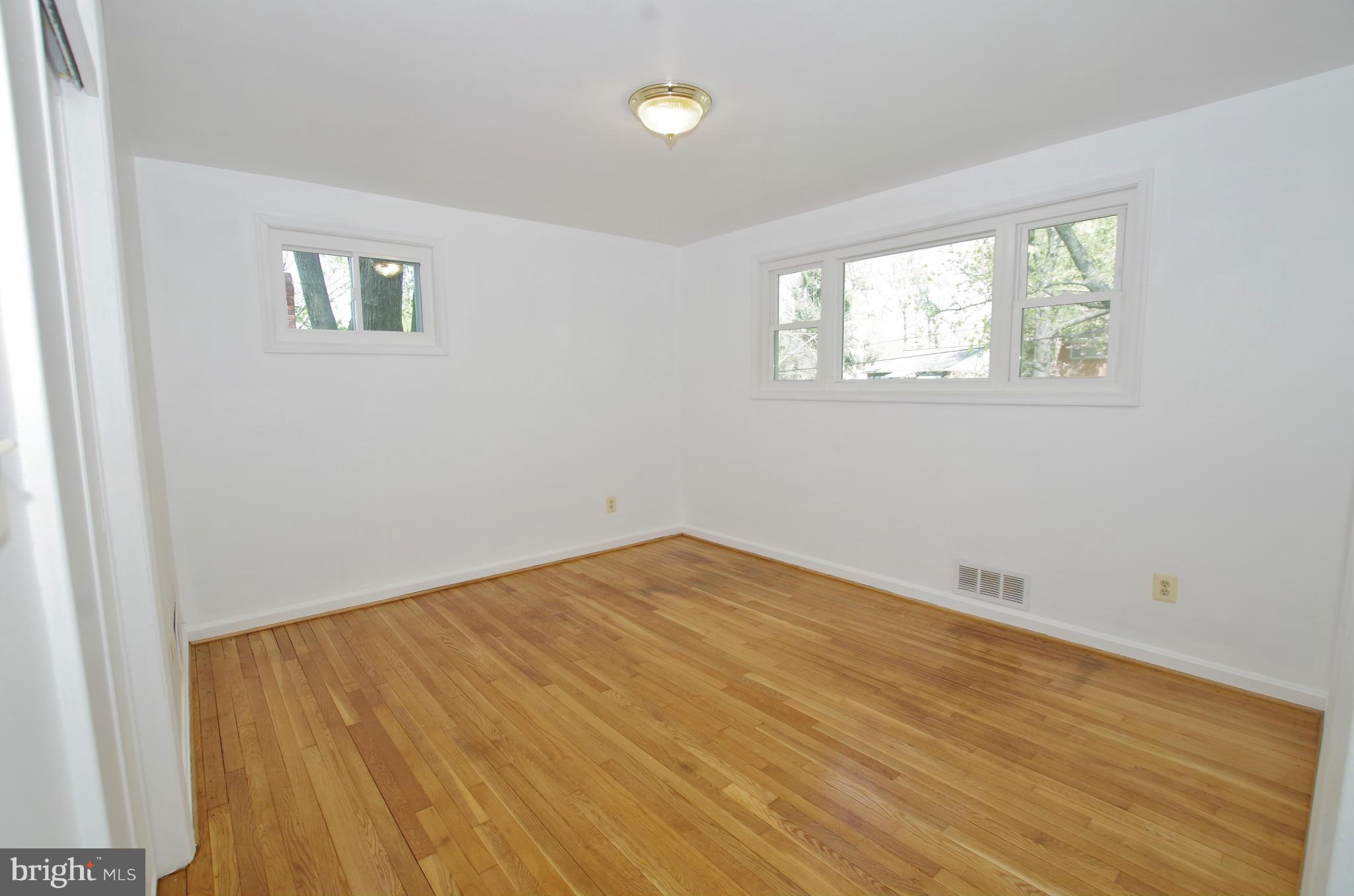 12712 Helen Road Silver Spring, MD 20906 - Photo 14 of 30 an empty room with a window