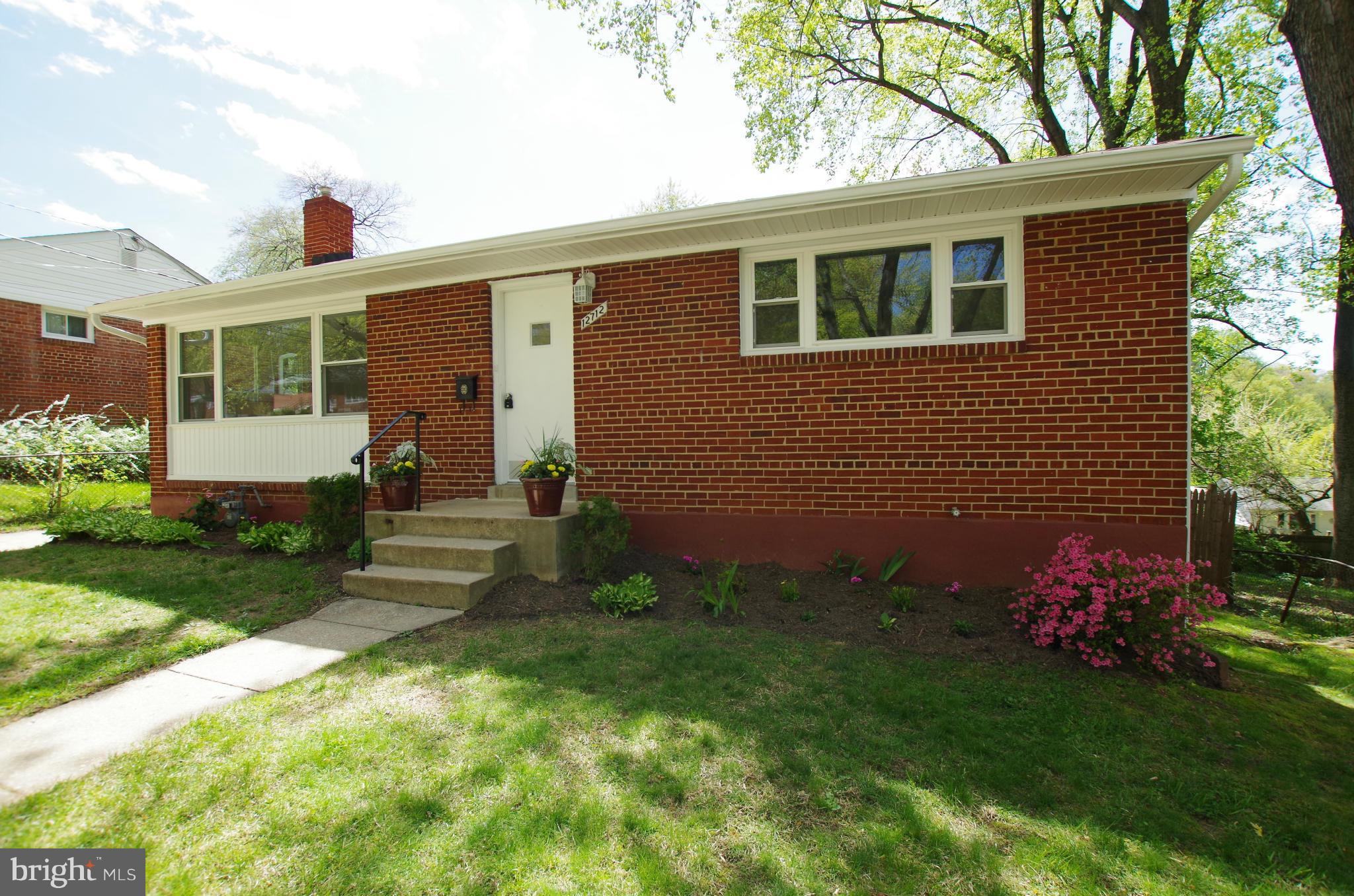 12712 Helen Road Silver Spring, MD 20906 - Photo 3 of 30 a view of a house with a yard
