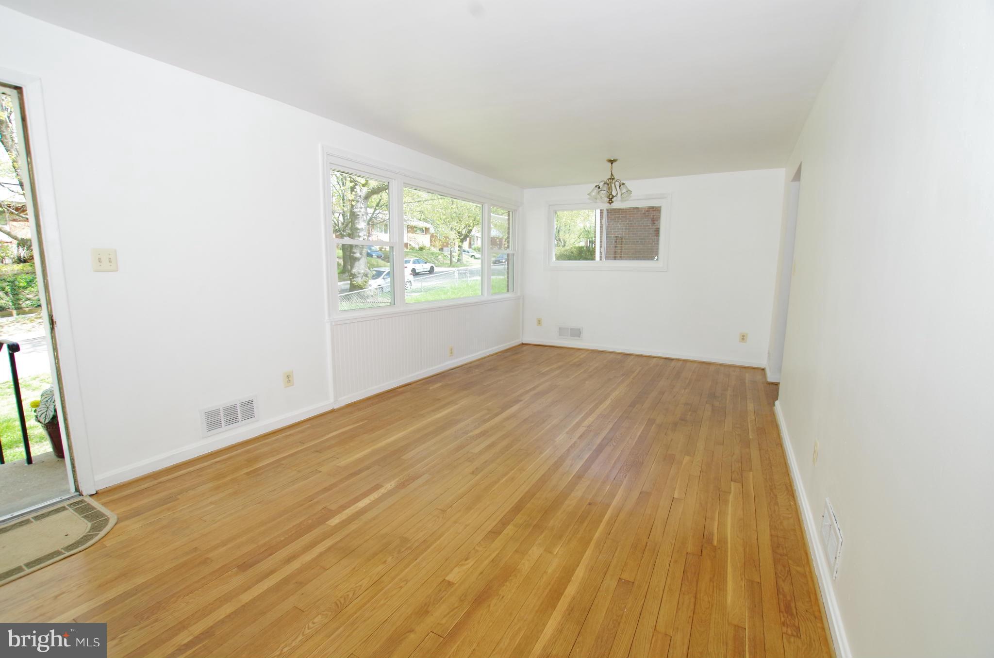 12712 Helen Road Silver Spring, MD 20906 - Photo 9 of 30 an empty room with windows