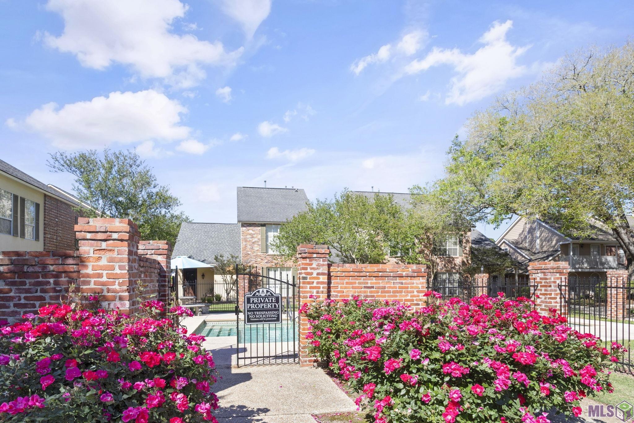 9007 Highland Road, Unit 25 Baton Rouge, LA 70810 - Photo 5 of 18 Community Pool Entrance