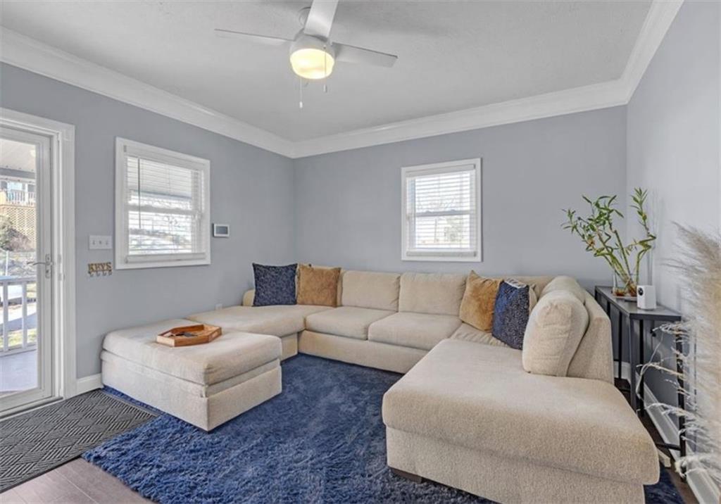 1146 Sims Street Southwest Atlanta, GA 30310 - Photo 5 of 20 a living room with furniture and a window