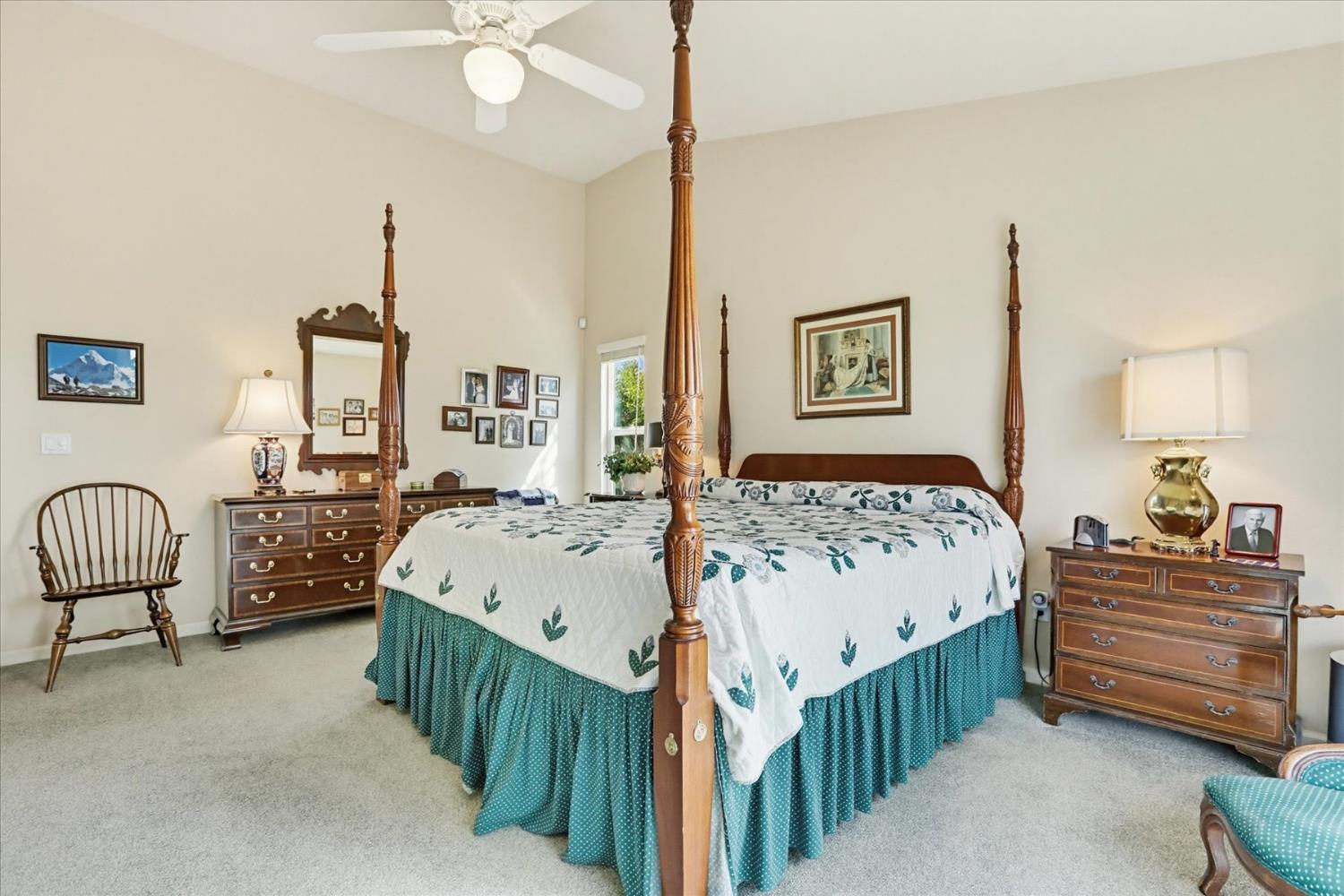 970 Morgan Ranch Drive Grass Valley, CA 95945 - Photo 21 of 76 a bedroom with a bed chandelier and a window