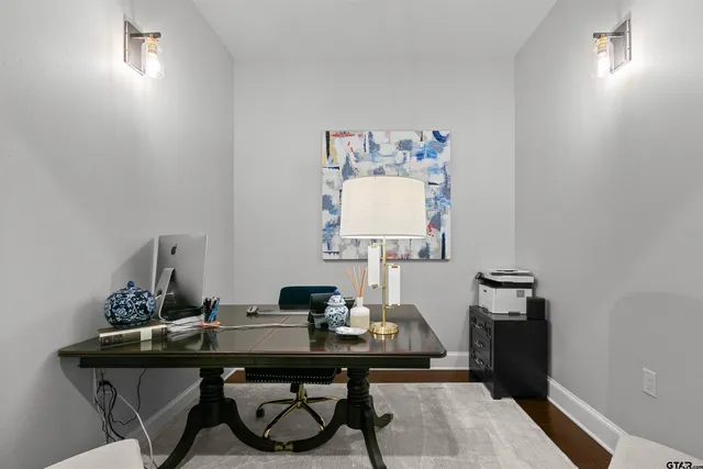 a view of a workspace with furniture