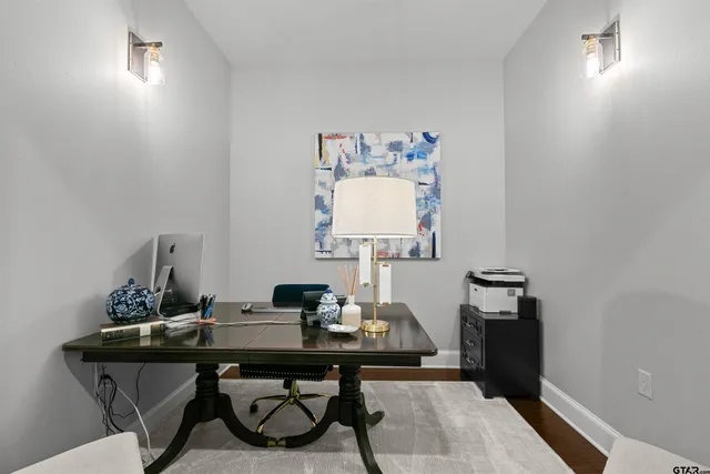 a view of a workspace with furniture