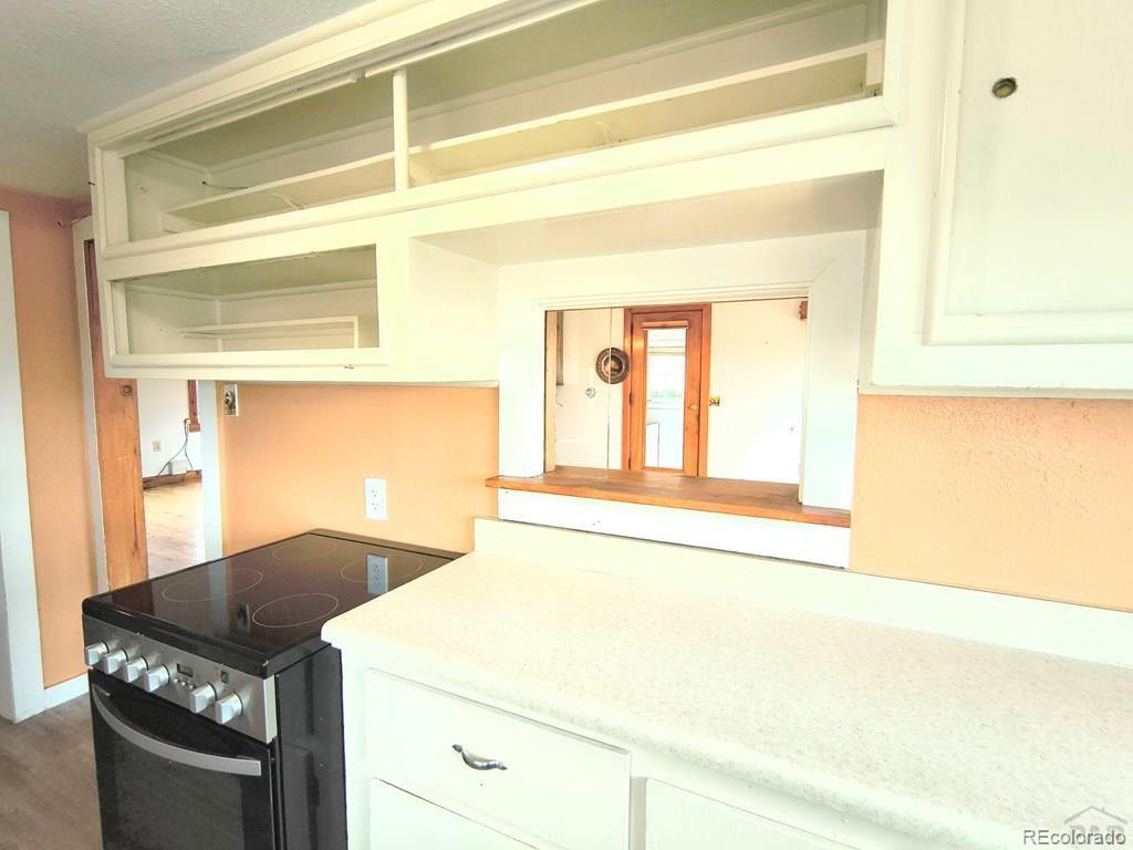 8180 Old San Isabel Road Rye, CO 81069 - Photo 11 of 35 a utility room with a window