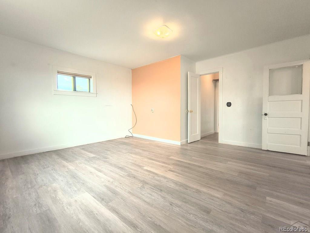 8180 Old San Isabel Road Rye, CO 81069 - Photo 20 of 35 wooden floor in an empty room