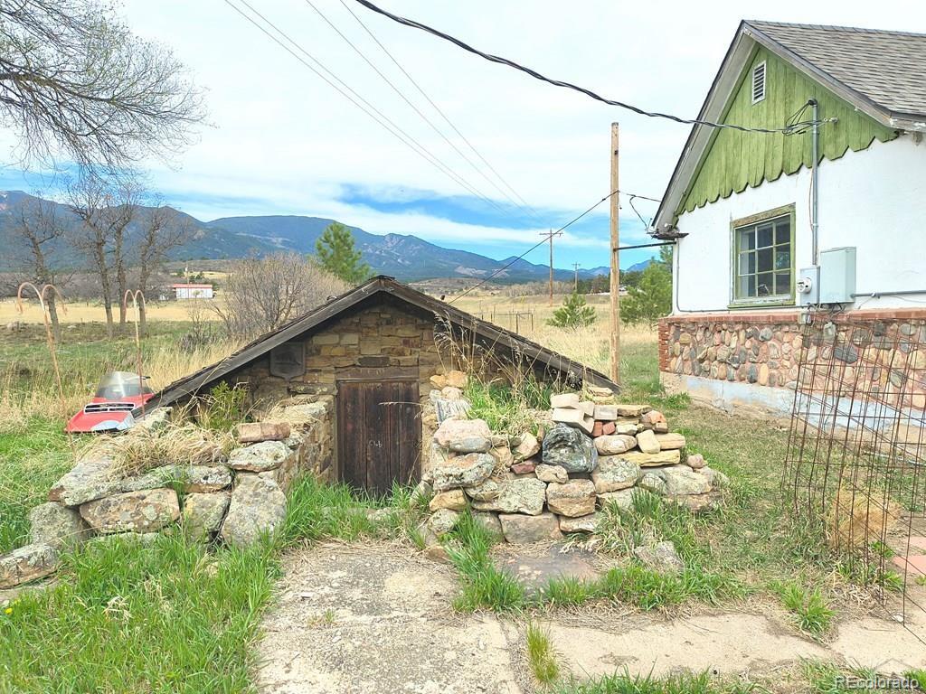 8180 Old San Isabel Road Rye, CO 81069 - Photo 4 of 35 a view of a house with a yard
