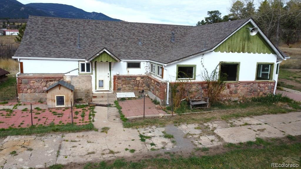 8180 Old San Isabel Road Rye, CO 81069 - Photo 5 of 35 front view of a house with a yard