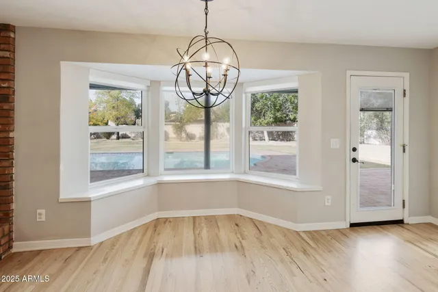 a view of a living room and a kitchen