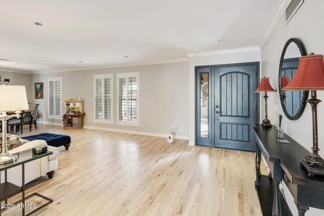 a view of a swimming pool with an outdoor seating and a yard