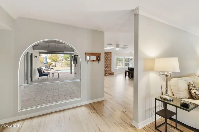 a front view of a house with swimming pool having outdoor seating