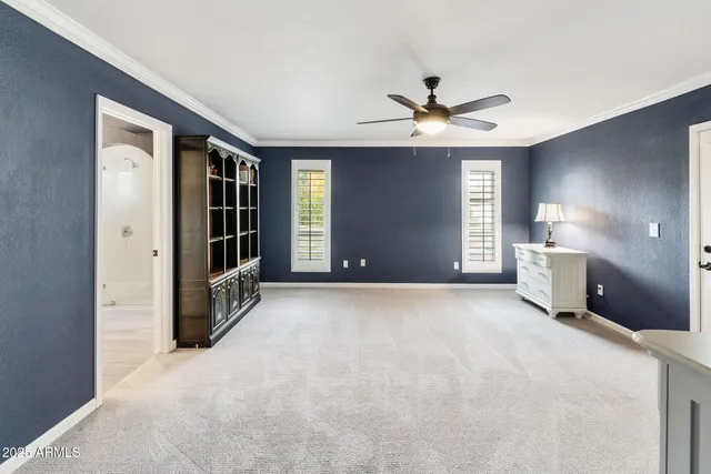 a view of a house with pool yard and sitting area