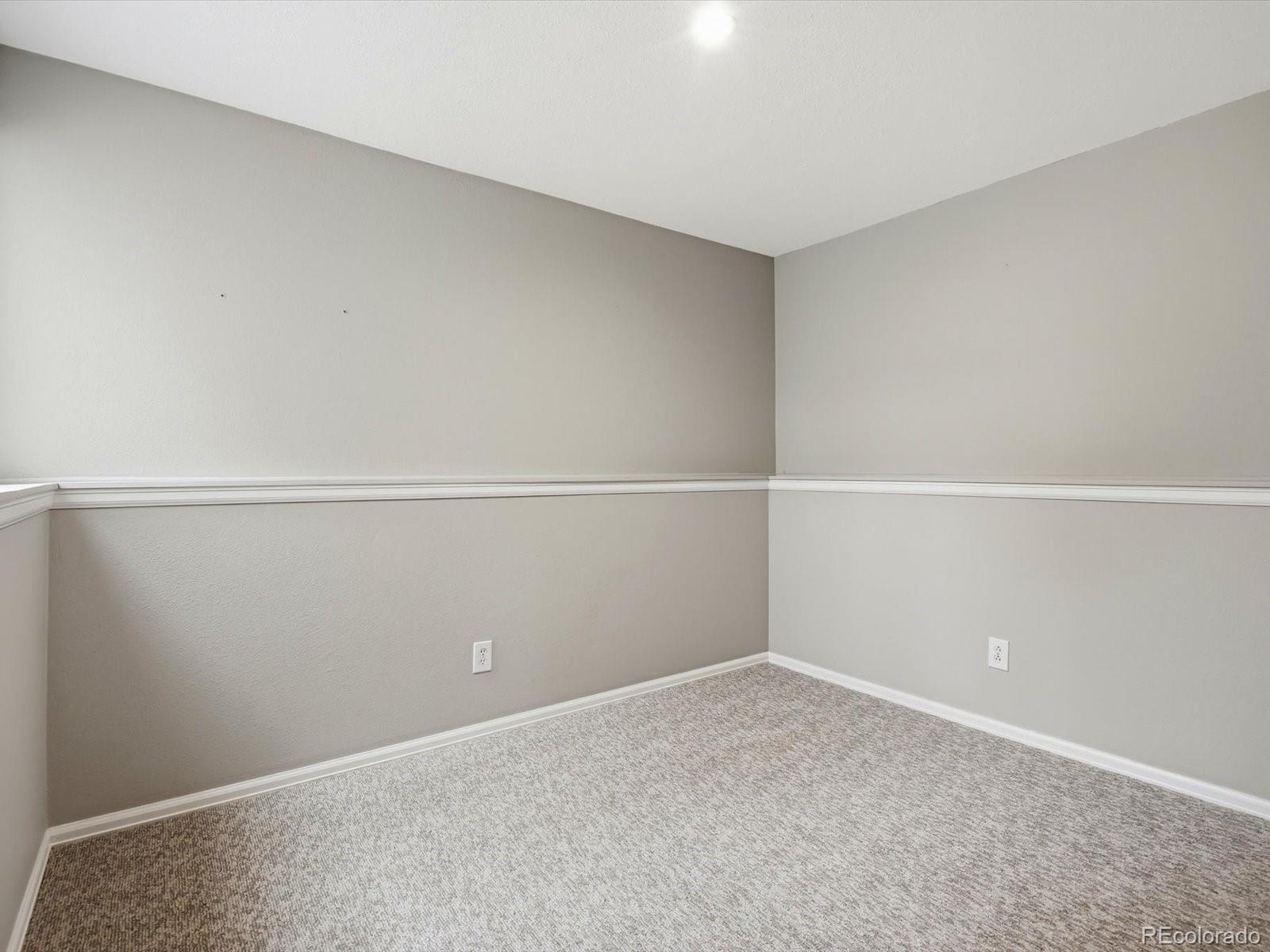 765 Stowe Street Highlands Ranch, CO 80126 - Photo 22 of 43 a view of an empty room