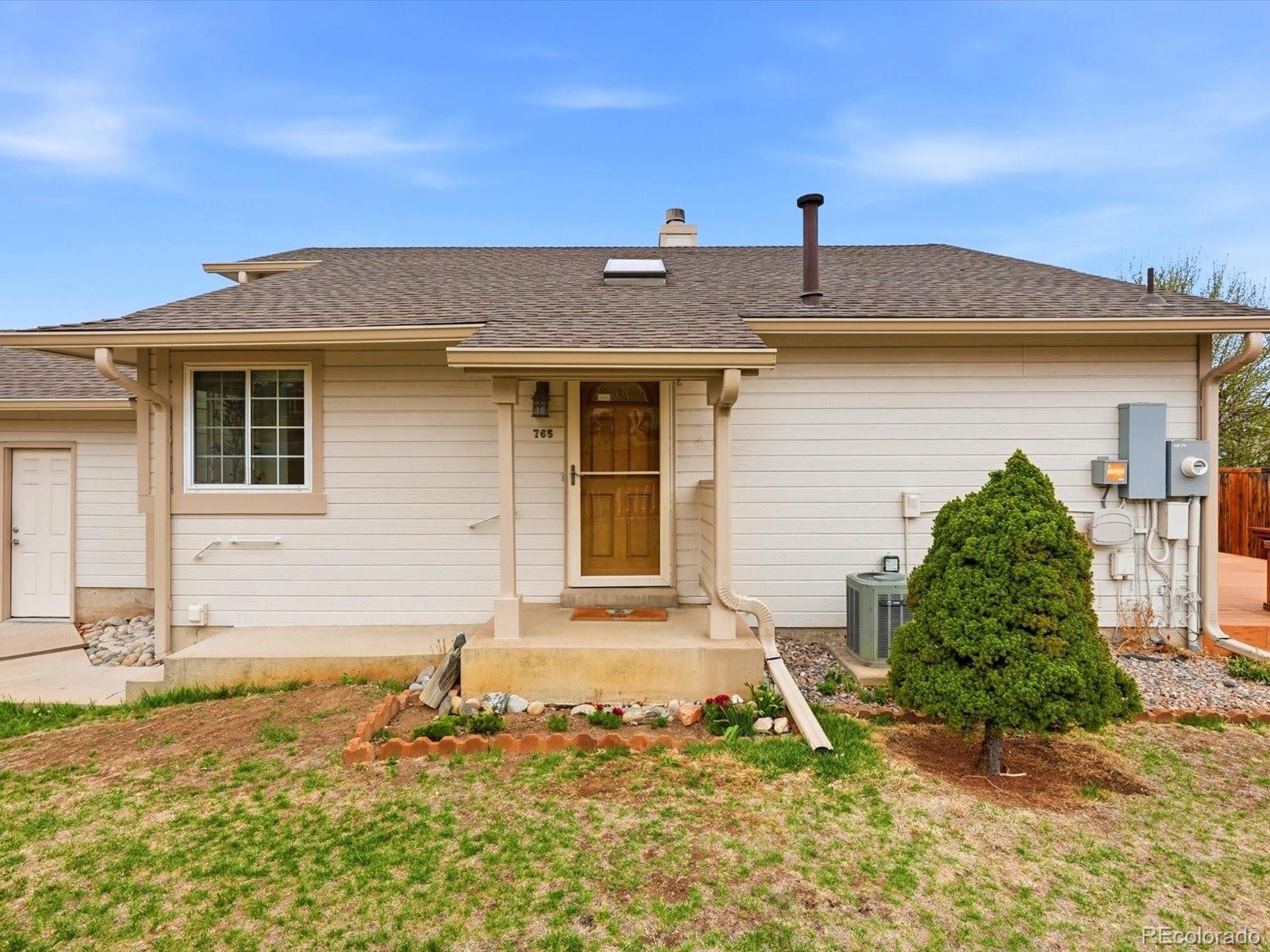 765 Stowe Street Highlands Ranch, CO 80126 - Photo 3 of 43 front view of a house