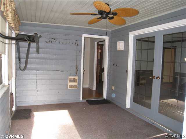 3006 Brookforest Road Midlothian, VA 23112 - Photo 4 of 8 a view of a hallway with a glass door shower