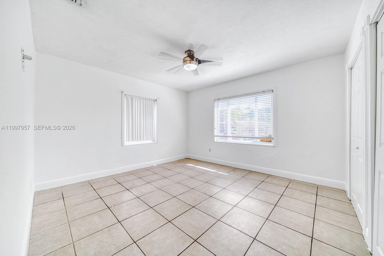 2171 Southwest 21st Street Miami, FL 33145 - Photo 19 of 31 a view of an empty room and window