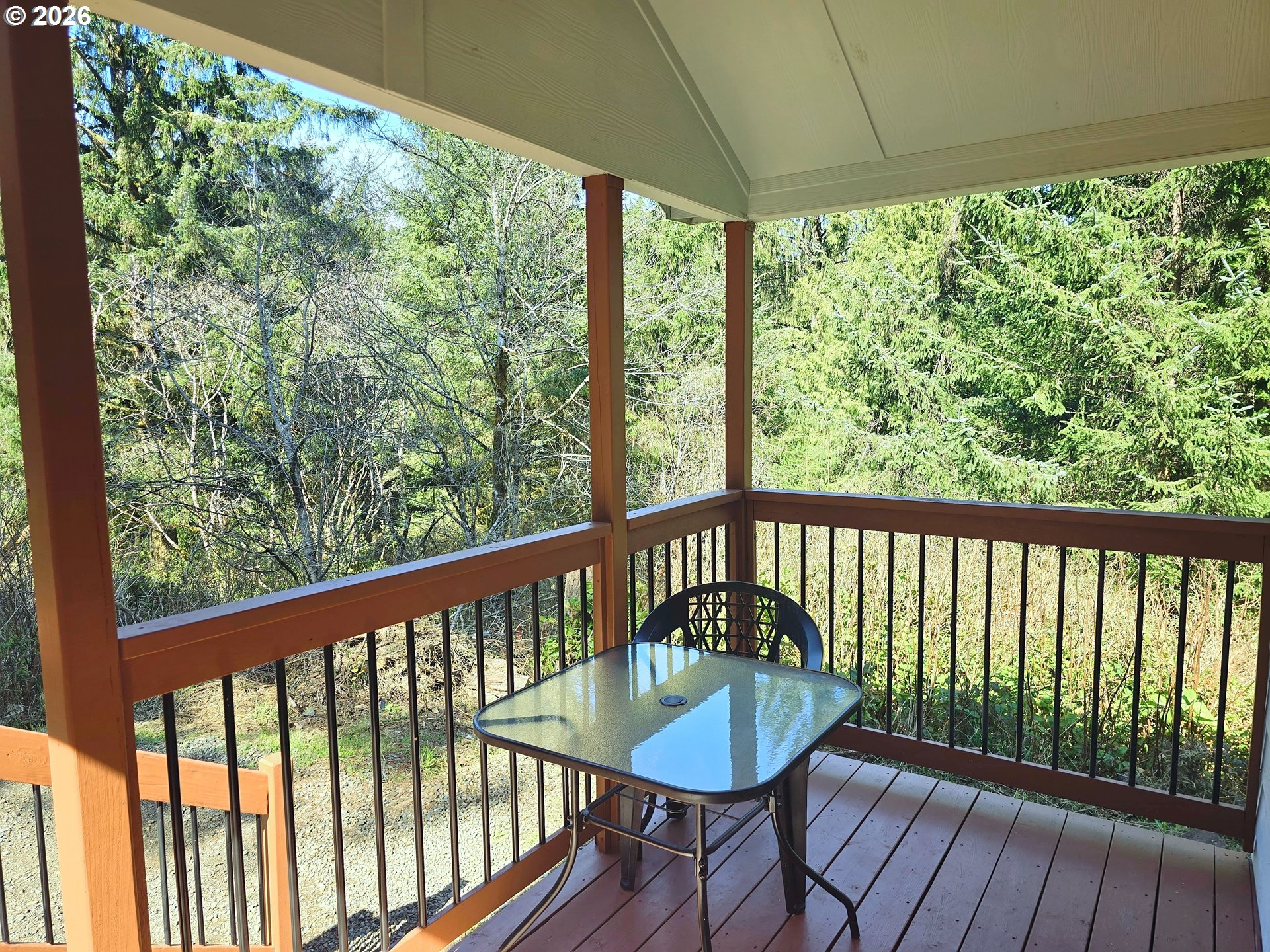 89491 Sutton Place Florence, OR 97439 - Photo 11 of 21 a view of a two chairs in the deck