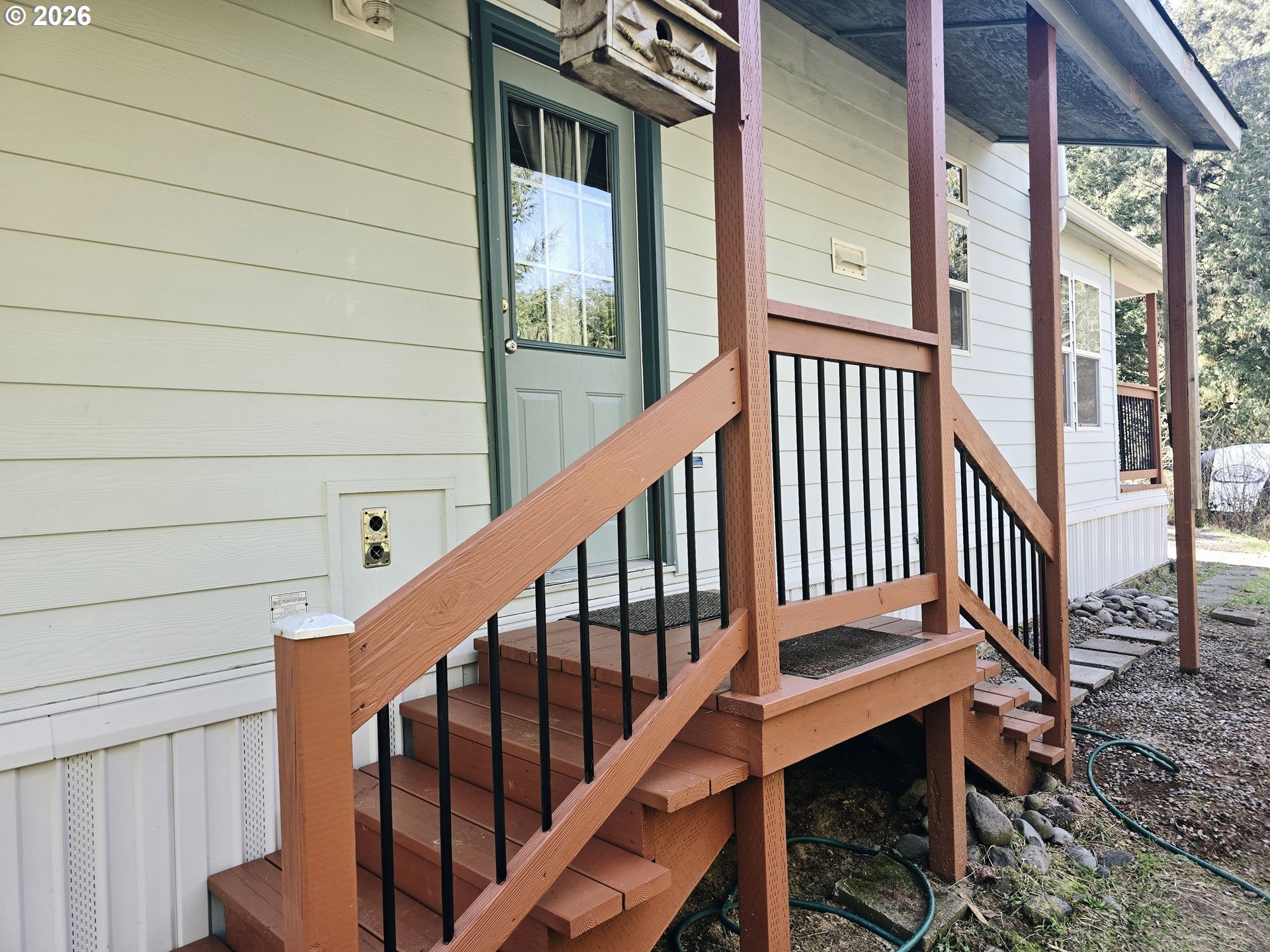 89491 Sutton Place Florence, OR 97439 - Photo 13 of 21 a view of a balcony with wooden floor