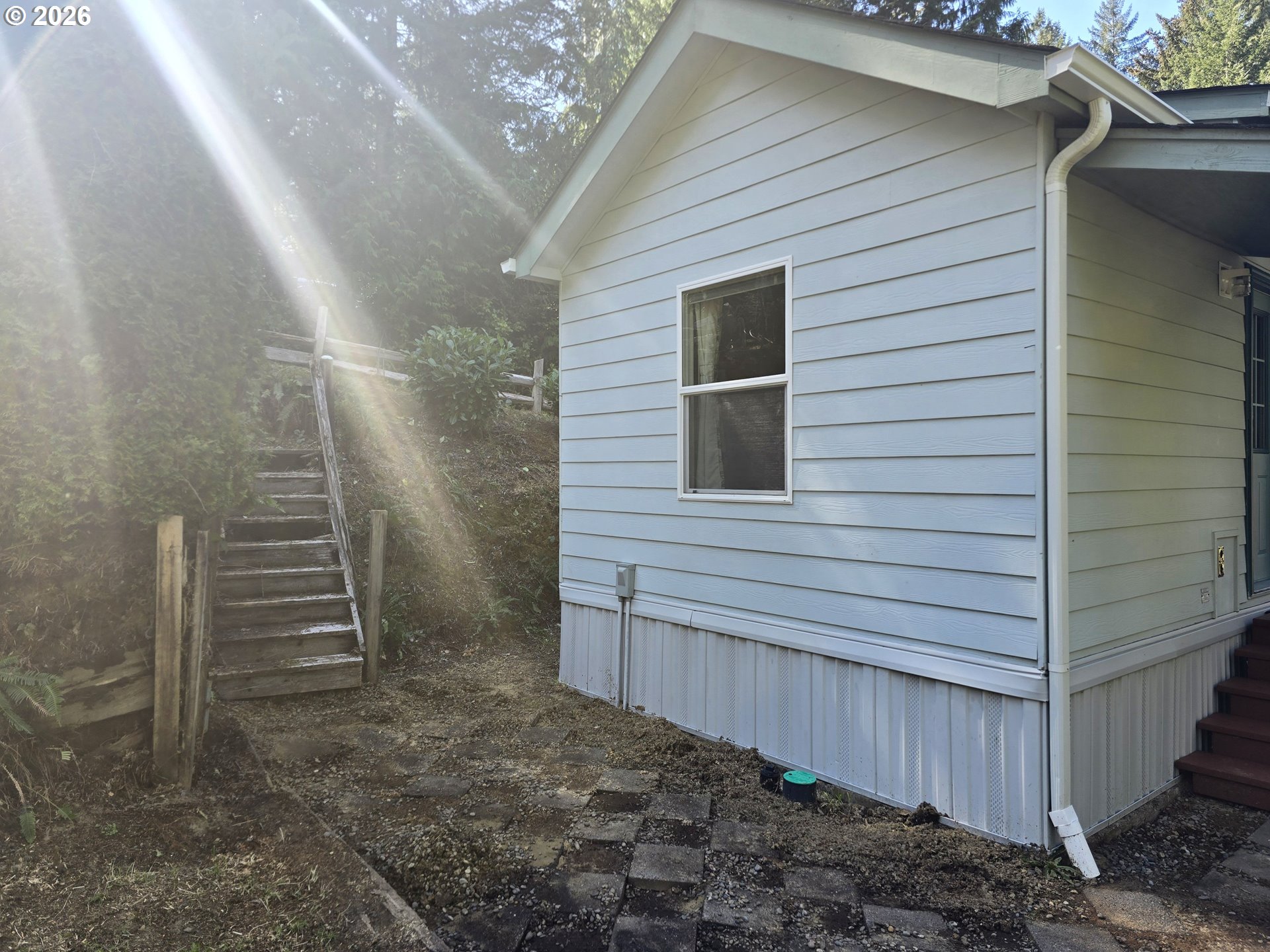 89491 Sutton Place Florence, OR 97439 - Photo 17 of 21 a view of a house with a backyard