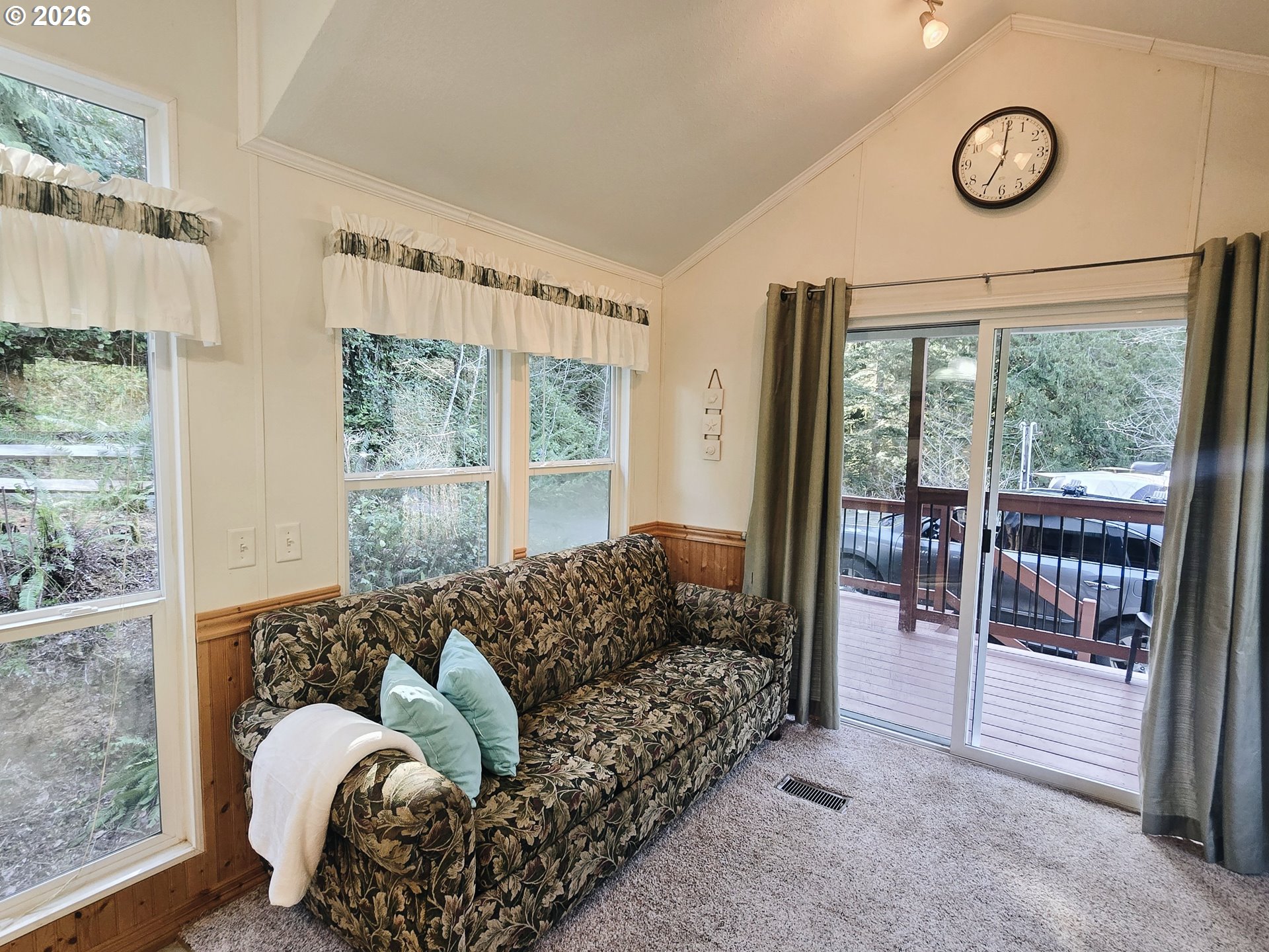 89491 Sutton Place Florence, OR 97439 - Photo 4 of 21 a living room with furniture and a large window