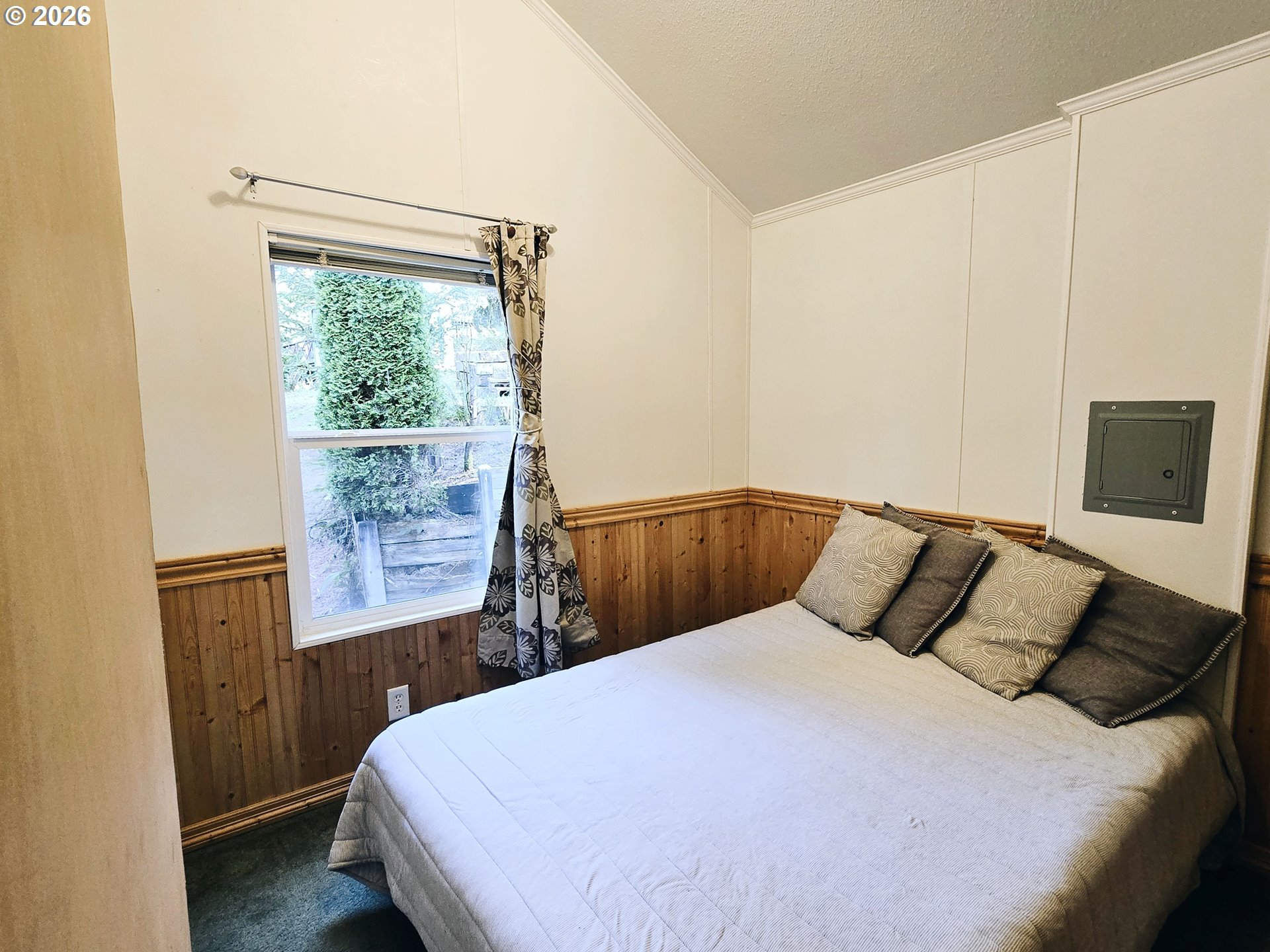 89491 Sutton Place Florence, OR 97439 - Photo 10 of 21 a bedroom with a bed and a window