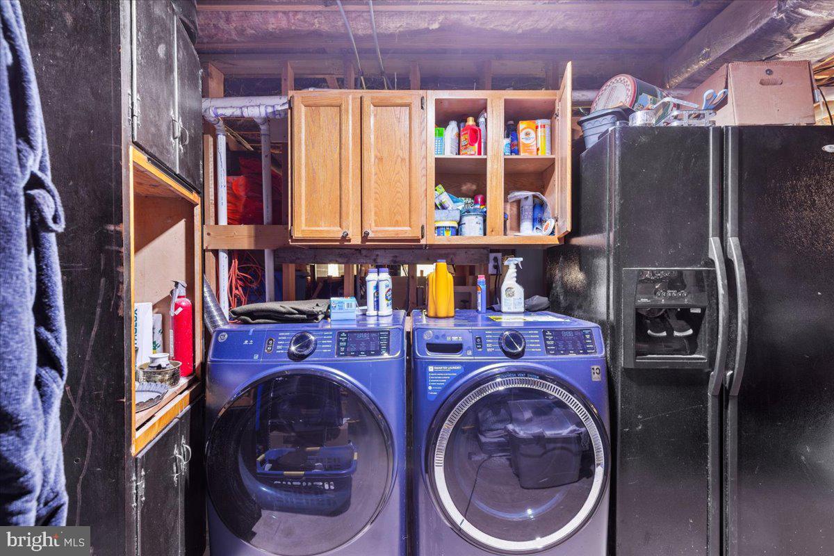 10346 Groves Farm Road Midland, VA 22728 - Photo 19 of 36 a utility room with dryer and washer