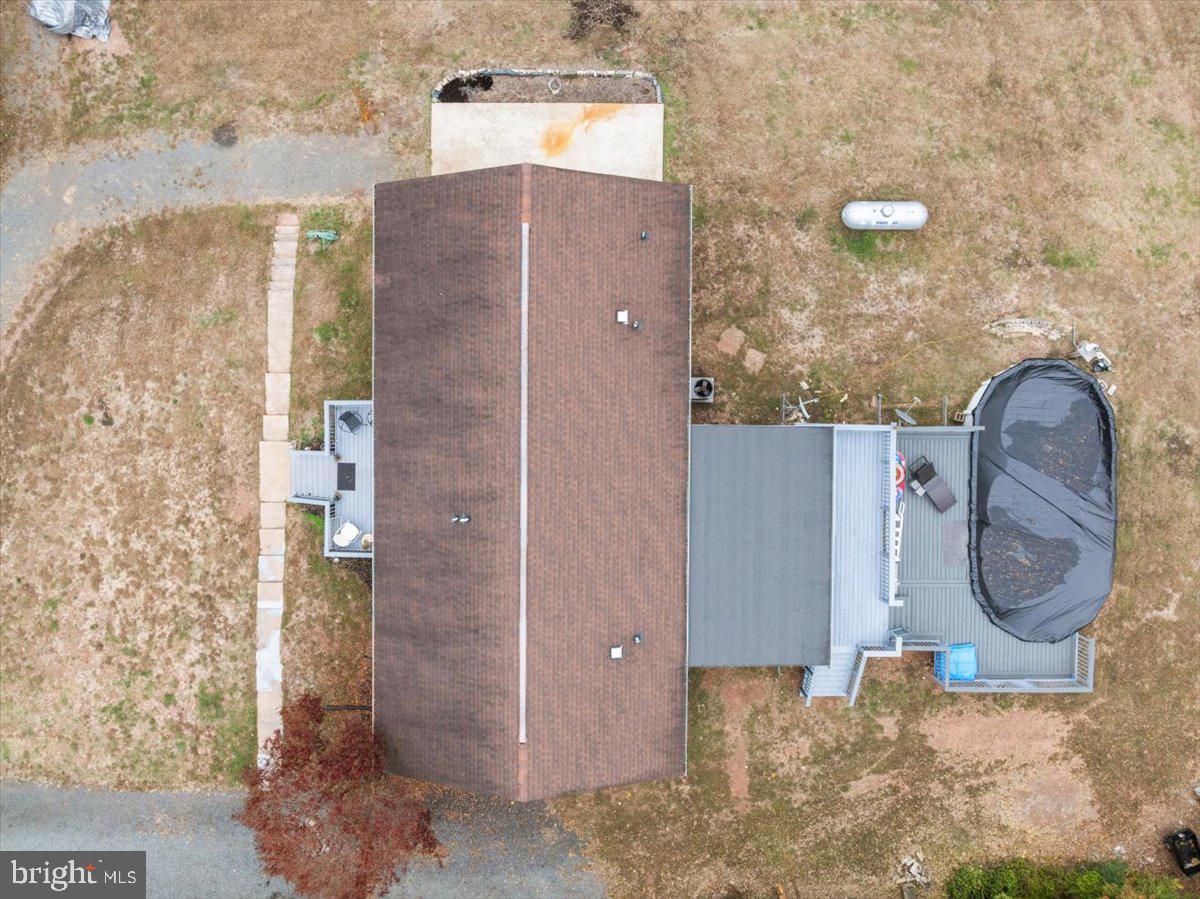 10346 Groves Farm Road Midland, VA 22728 - Photo 26 of 36 view of a bathroom with a shower and mirror