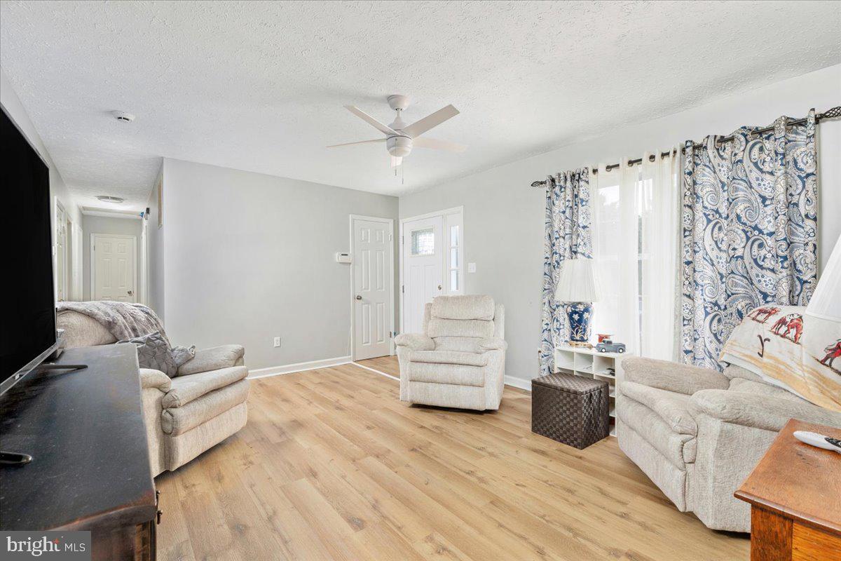10346 Groves Farm Road Midland, VA 22728 - Photo 3 of 36 a living room with furniture and white walls