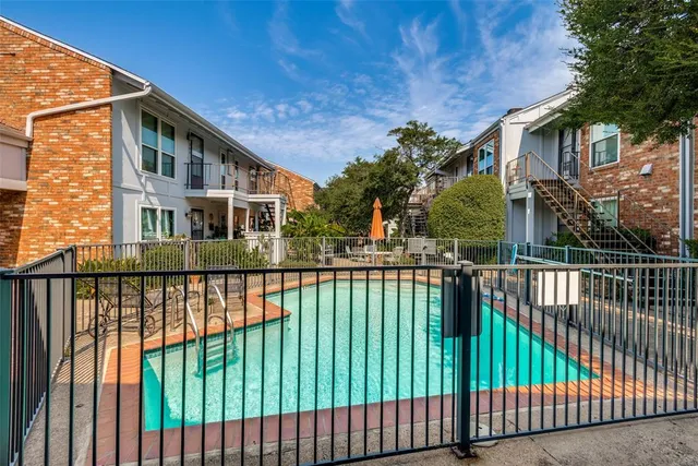 a view of an empty room with stairs