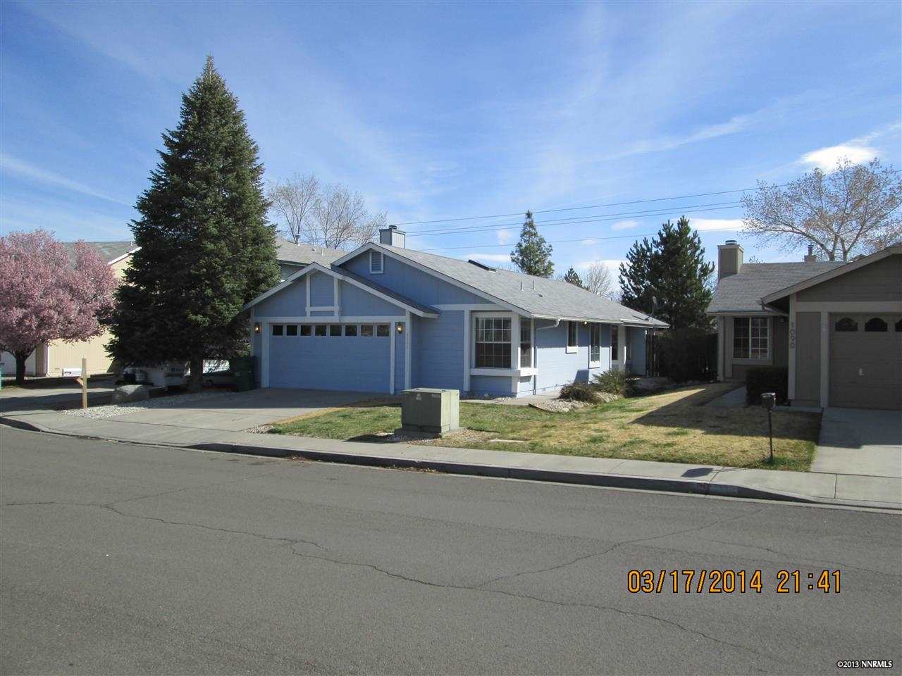 a house with trees in front of it