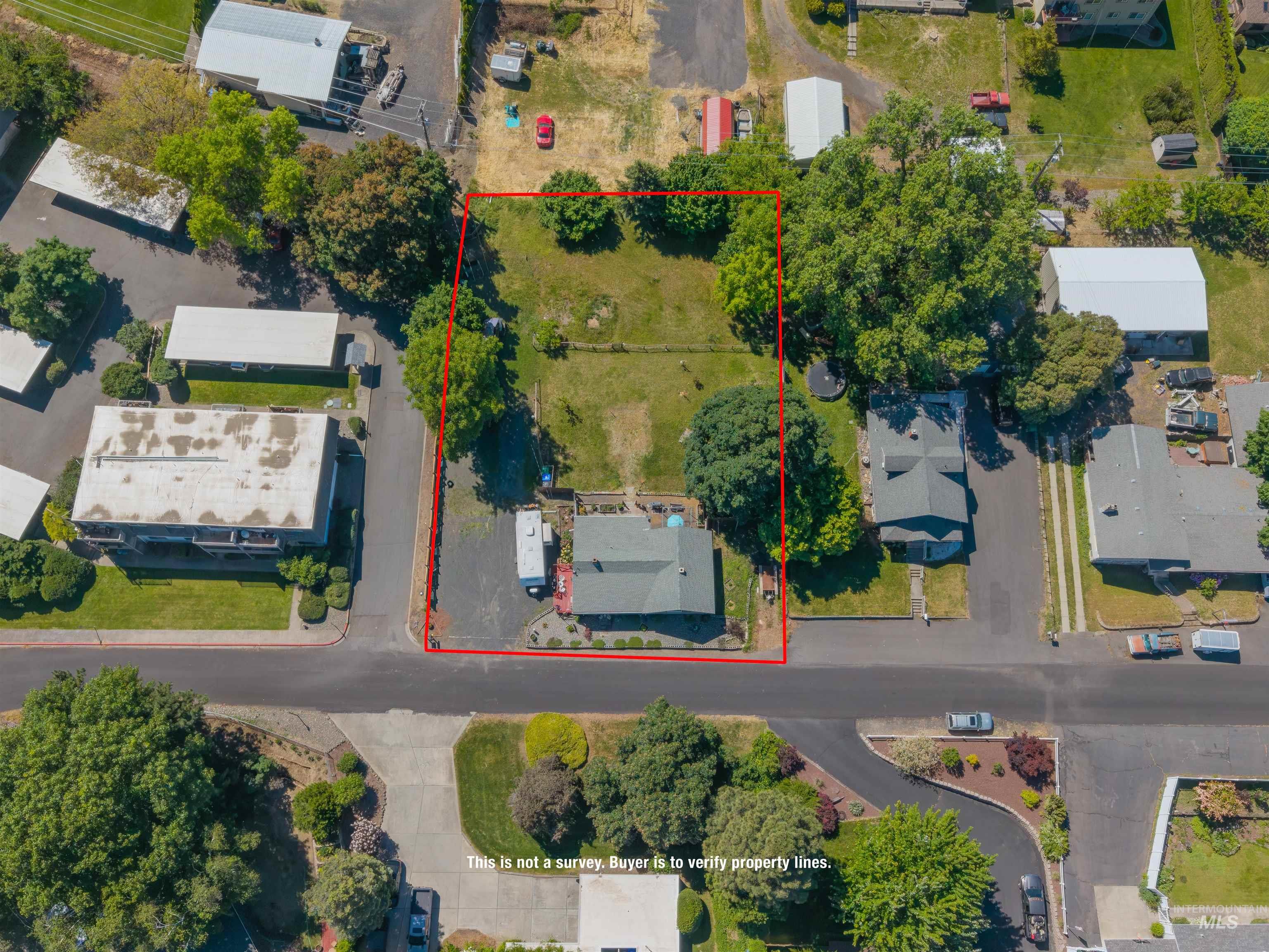 238 Hillcrest Road Lewiston, ID 83501 - Photo 9 of 27 Aerial perspective showcasing a rectangular parcel with a single-story residence