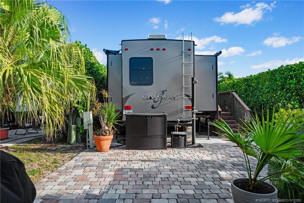 Undisclosed Address Jensen Beach, FL 34957 - Photo 12 of 47 a view of a entryway door of the house